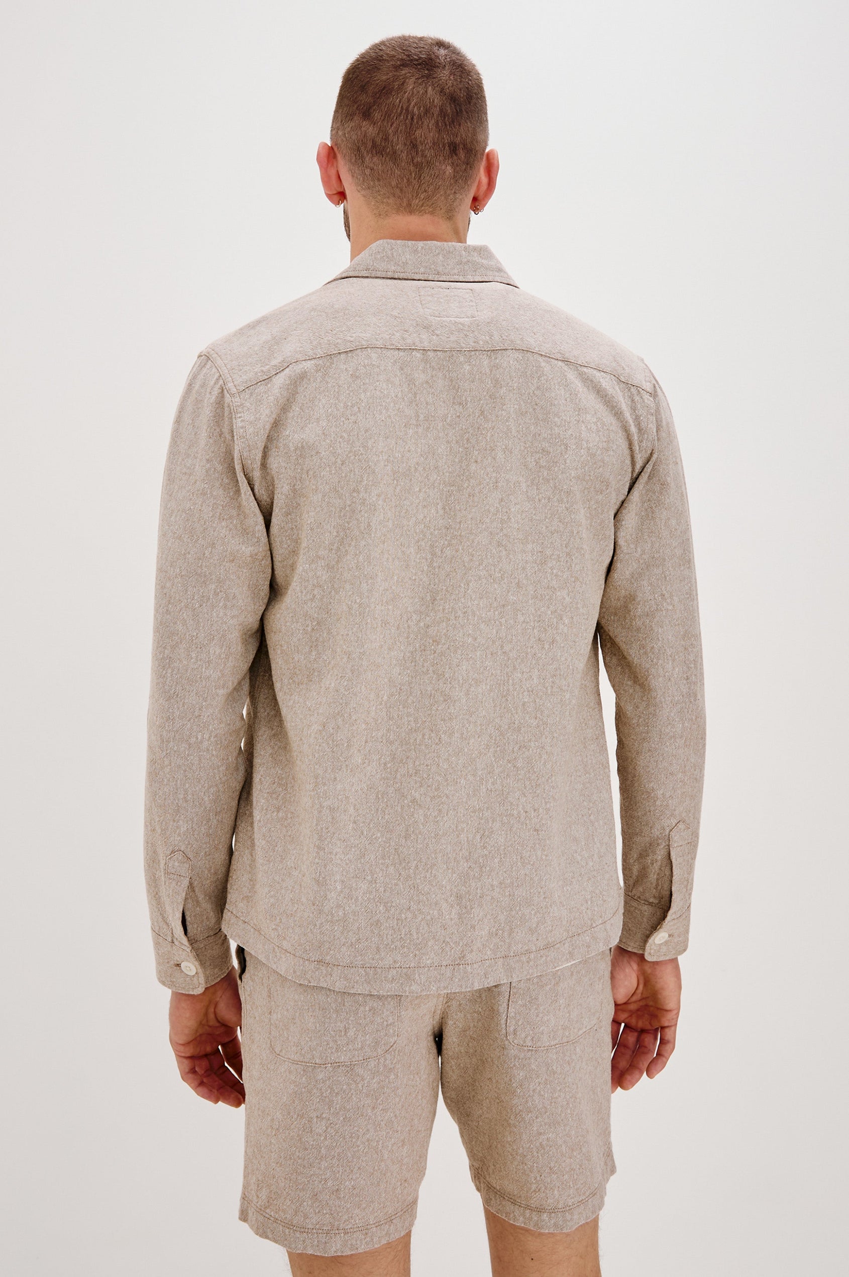 Hayes Shirt Jacket with Long Sleeves and Chest Flap Pockets with Button Closure, Exposed Button Front in Blue Mirage. Back View Shown on Model.