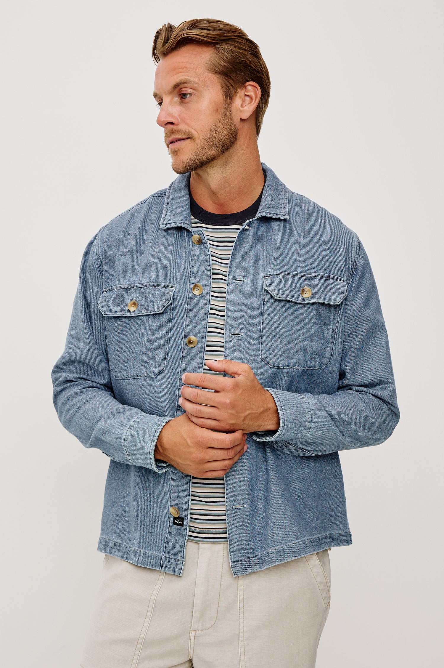 Hayes Shirt Jacket in Linen Cotton Slub With Long Sleeves, Chest Patch Pockets, and Collar in Medium Wash Indigo Colorway - Upper Body Front View Featured on Model