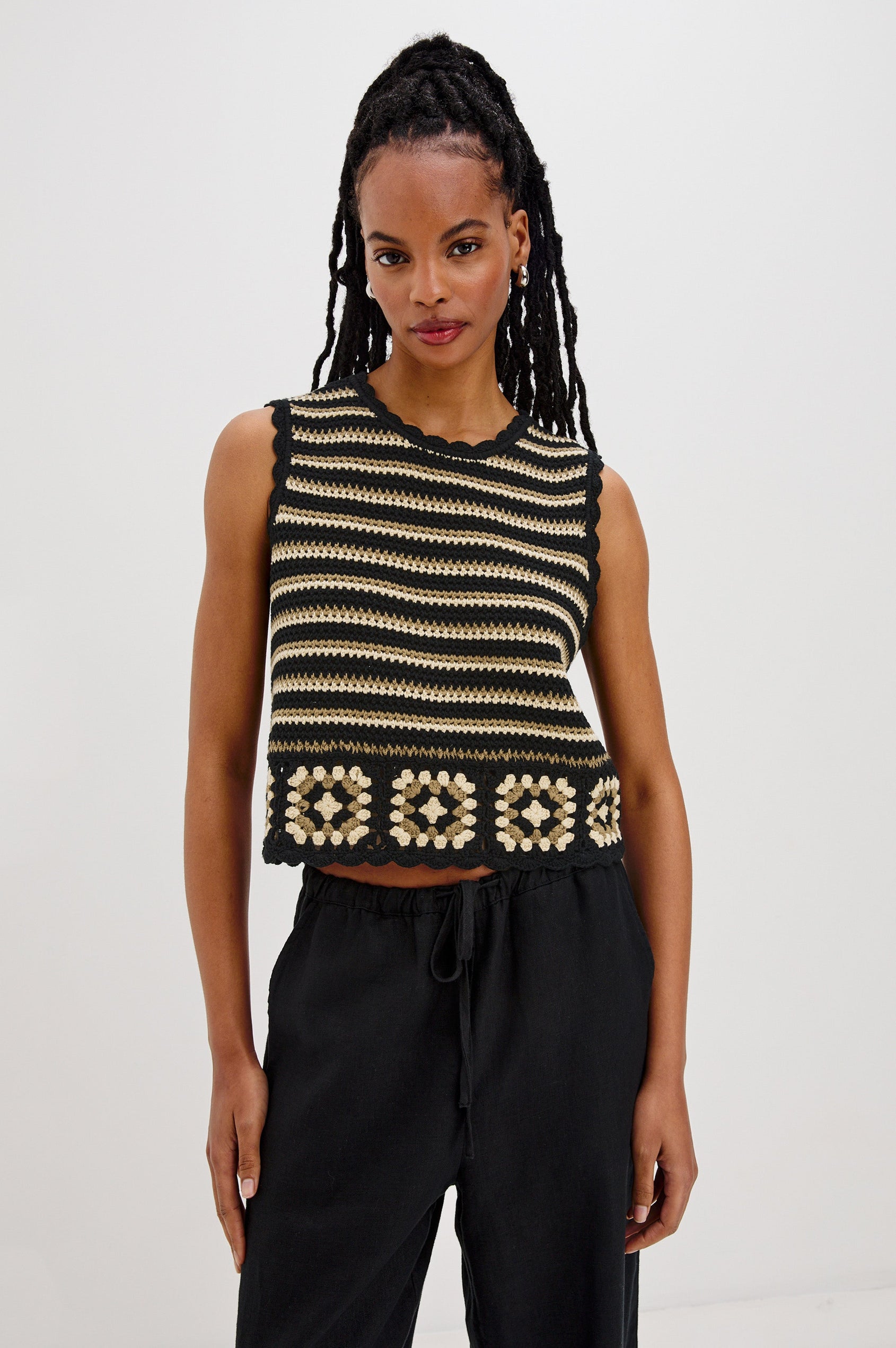 Hazel Crew Neck Crochet Top with Scalloped Hem, Sleeveless in Black and Brown Milos Colorway. Front View Shown on Model.