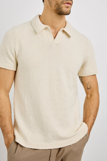Heath Polo Shirt with Short Sleeves in Cream Colorway. Front Detail View Shown on Model.