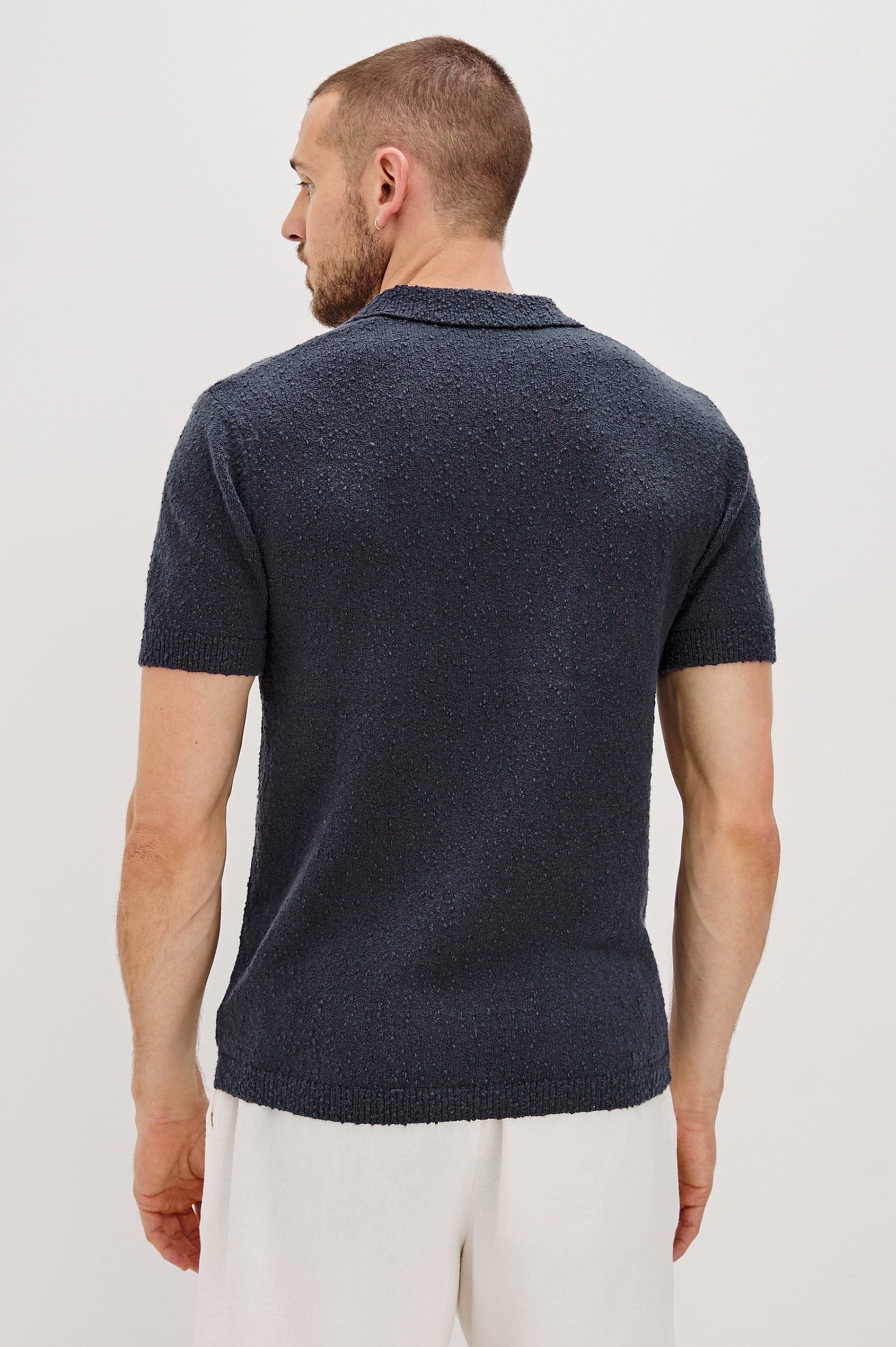 Heath Johnny Collar Polo with Short Sleeves in Midnight Blue Colorway. Back View Shown on Model.