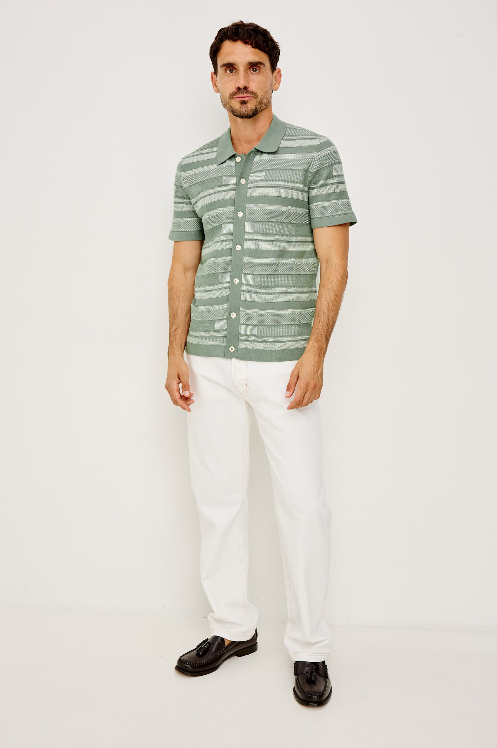 Henri Polo Shirt in Cotton Knit With Collar, Front Buttons, Short Sleeves, and Relaxed Fit in Sage Cream Block Colorway - Full Body Front View Featured on Model