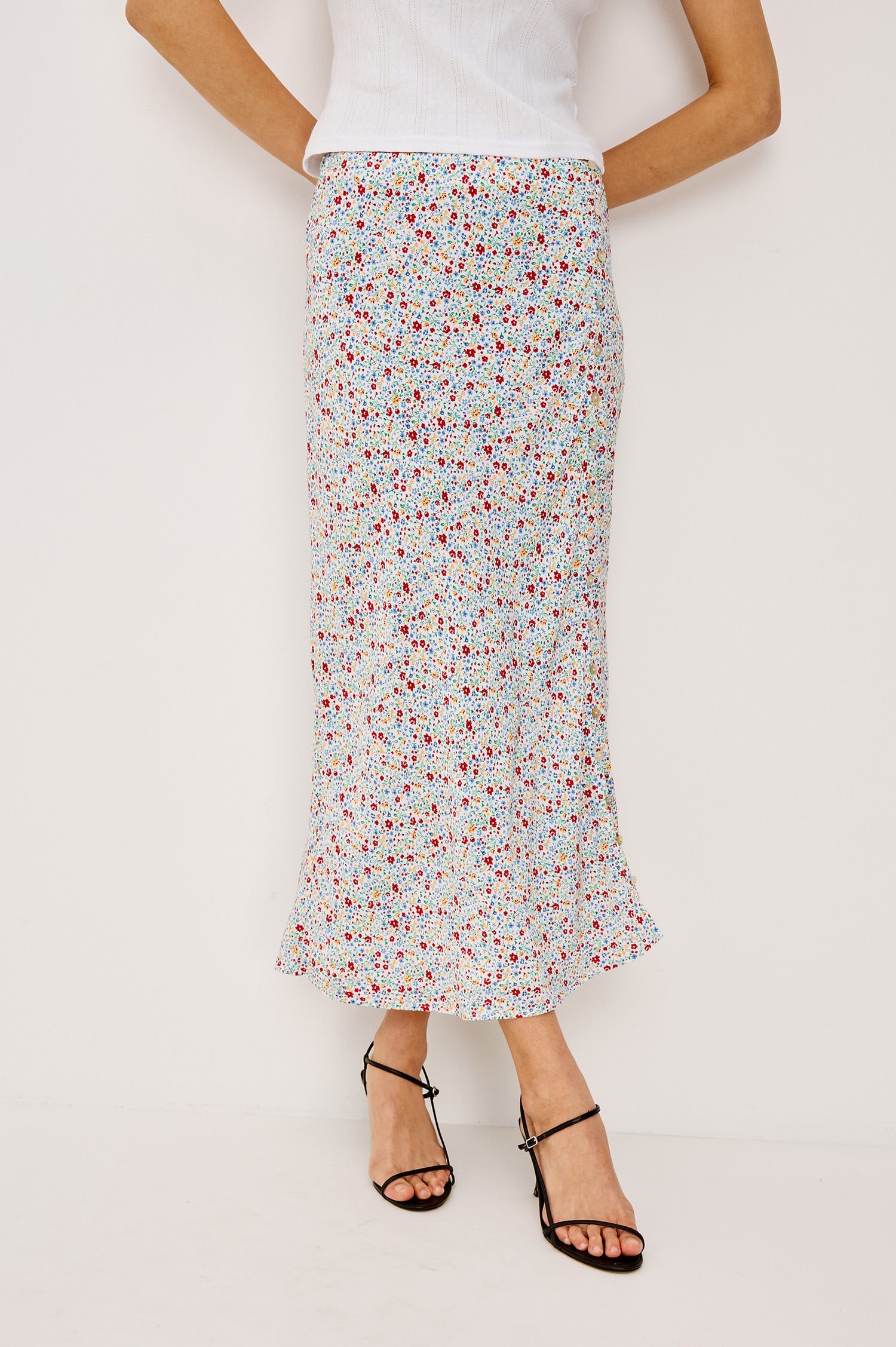 Hepburn High-Waisted Midi Skirt With A-Line Silhouette, Side Slit With Button-and-Loop Closures, and Full Lining in Meadow Colorway - Lower Body Front View Featured on Model