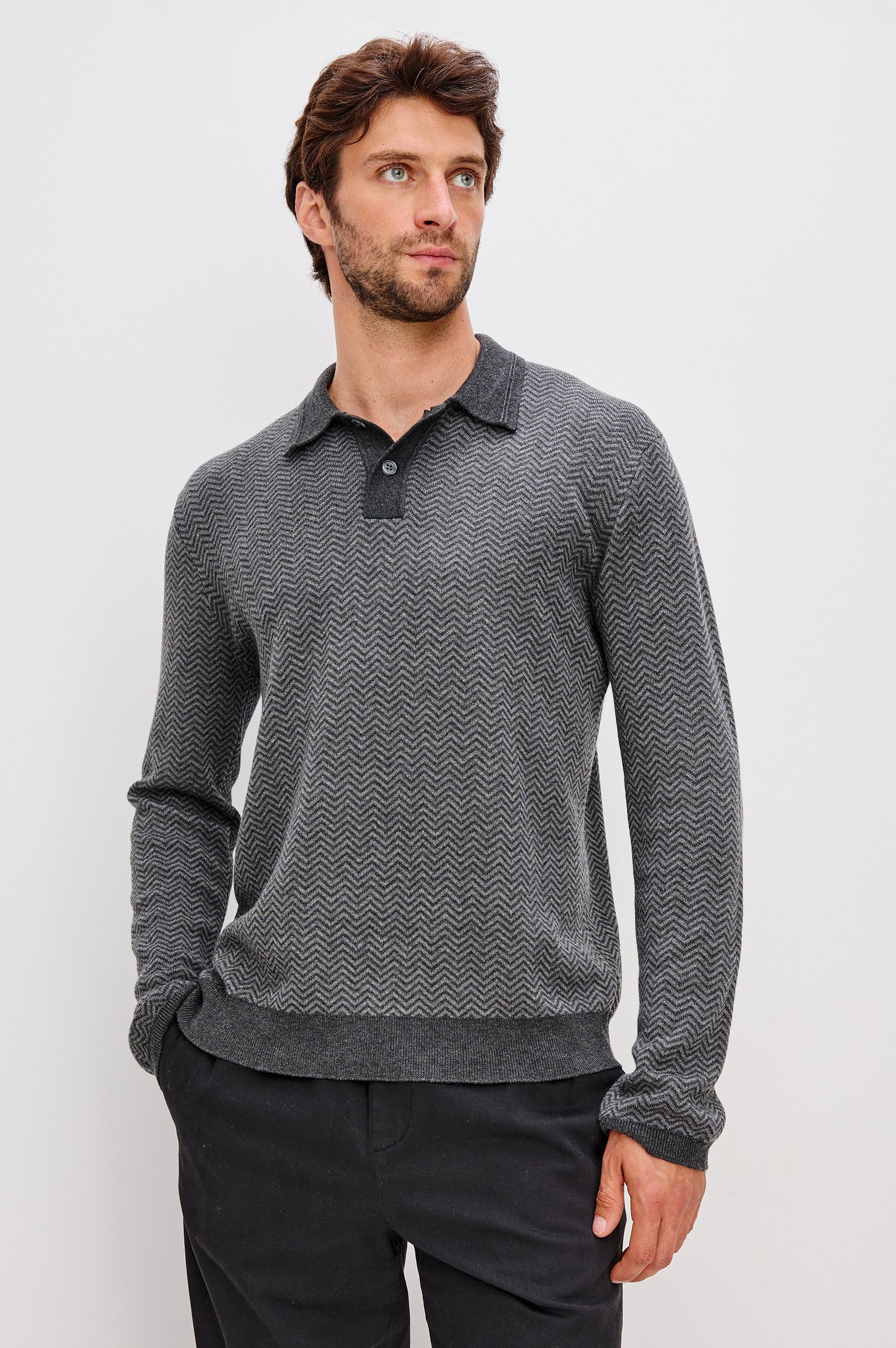 Herrington Long-Sleeve Collared Sweater with a Two Button Placket and a Herringbone Jacquard in Charcoal Herringbone Melange Colorway. Front View Featured on Model.