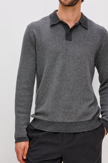 Herrington Long-Sleeve Collared Sweater with a Two Button Placket and a Herringbone Jacquard in Charcoal Herringbone Melange Colorway. Front Detail View Featured on Model.