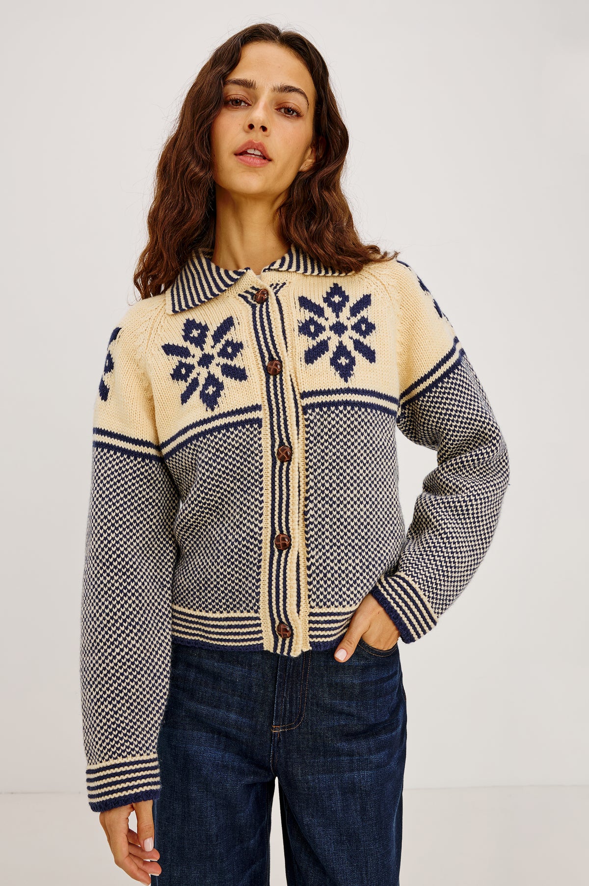 Hilde Cardigan in Fair Isle Jacquard Knit With Relaxed Fit, Wide Collar, Front Buttons, and Long Sleeves in Snowflake Colorway - Front View Featured on Model.