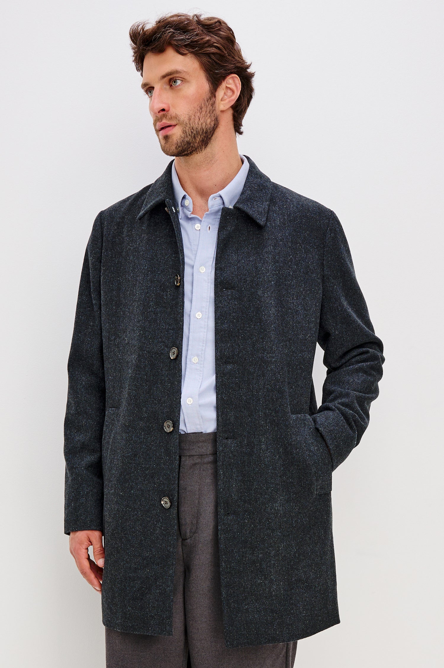 Hockney Overcoat in Wool Blend With Collar, Front Buttons, Long Sleeves, Back Vent, and Side Zip Welt Pockets in Celestial Tweed Colorway - Upper Body Front View Featured on Model