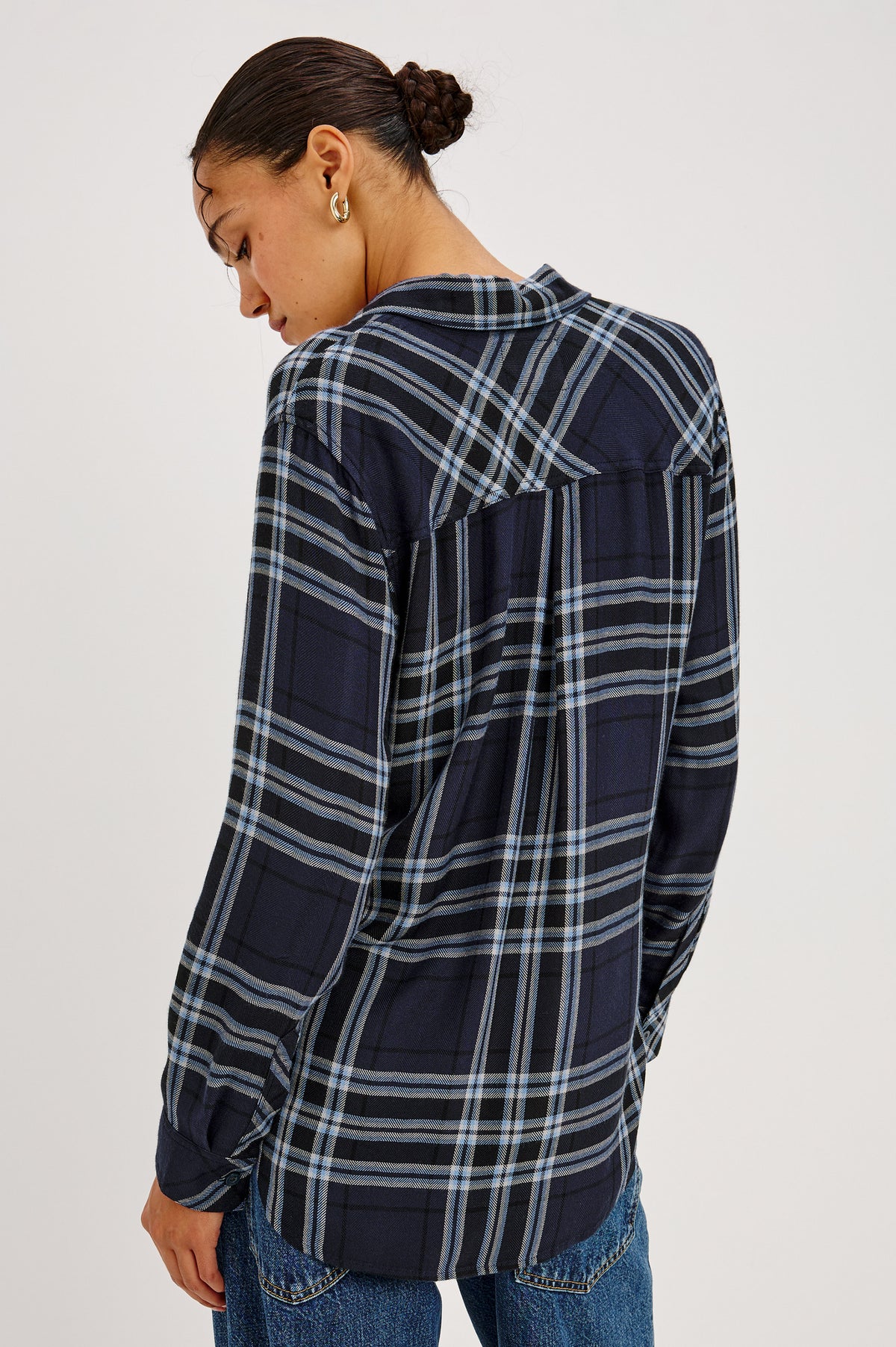 Hunter Shirt Plaid Button-Up With Relaxed Fit, Spread Collar, Chest Pocket, Long Sleeves, and Curved Hem in Indigo Sky Colorway - Back Crop View Featured on Model.