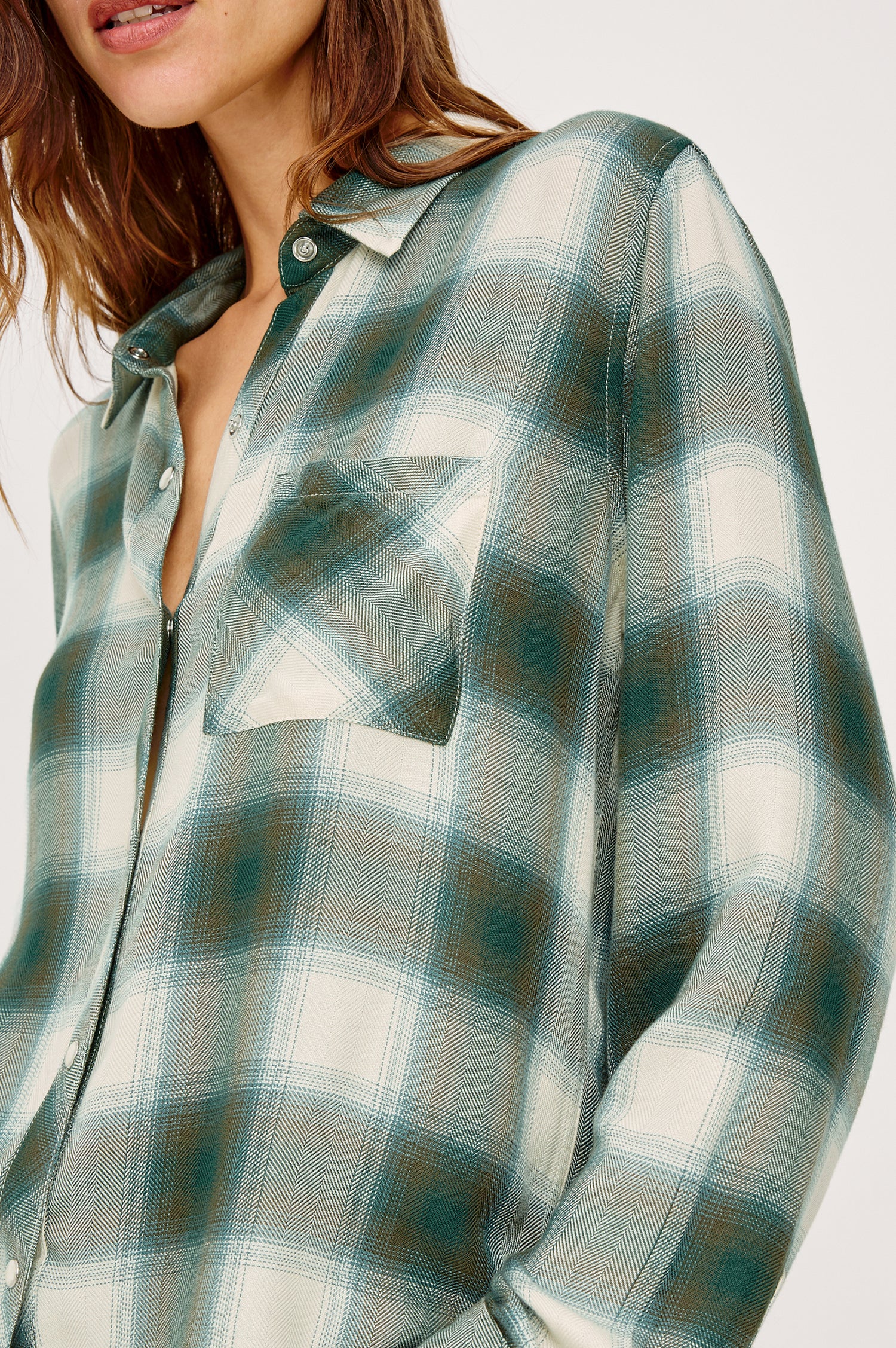 Hunter Button-Up Shirt in Signature Rayon With Collar, Front Buttons, Chest Patch Pocket, and Long Sleeves in Ivory Olive Teal Plaid Colorway - Upper Body Close Up Front View Featured on Model