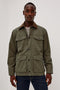 Huntly Jacket in Twill With Plaid Lining, Corduroy Collar, Storm Flap Snap-and-Zip, Four Front Snap Flap Pockets, and Long Sleeves in Highland Colorway - Upper Body Front View Featured on Model