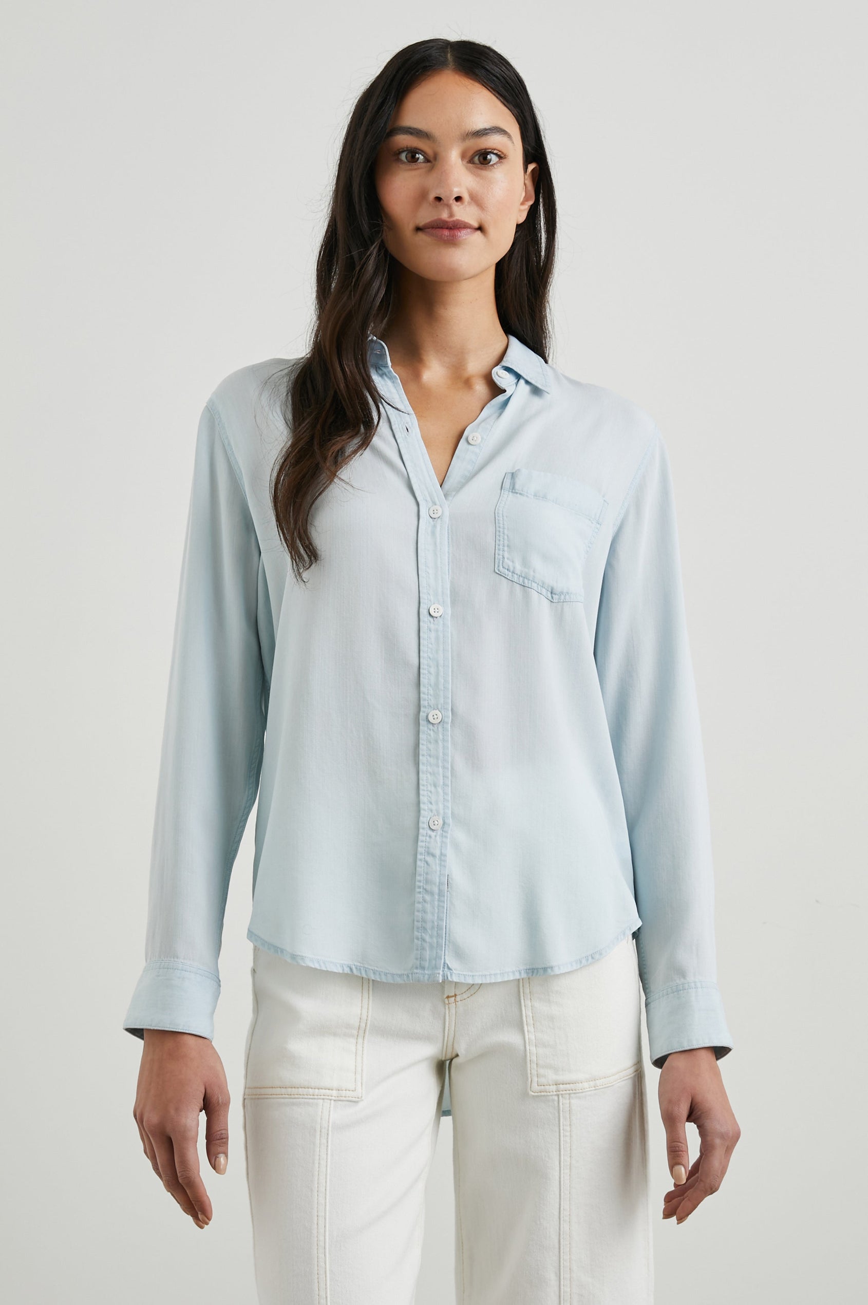 Ingrid Long Sleeve Denim Button Up with a Chest Patch Pocket in Light Vintage Colorway - Front View Featured on Model