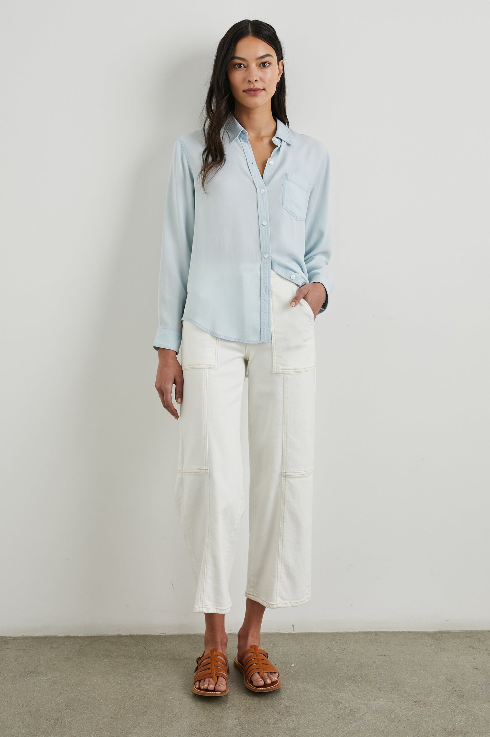 Ingrid Long Sleeve Denim Button Up with a Chest Patch Pocket in Light Vintage Colorway - Front Full Body View Featured on Model