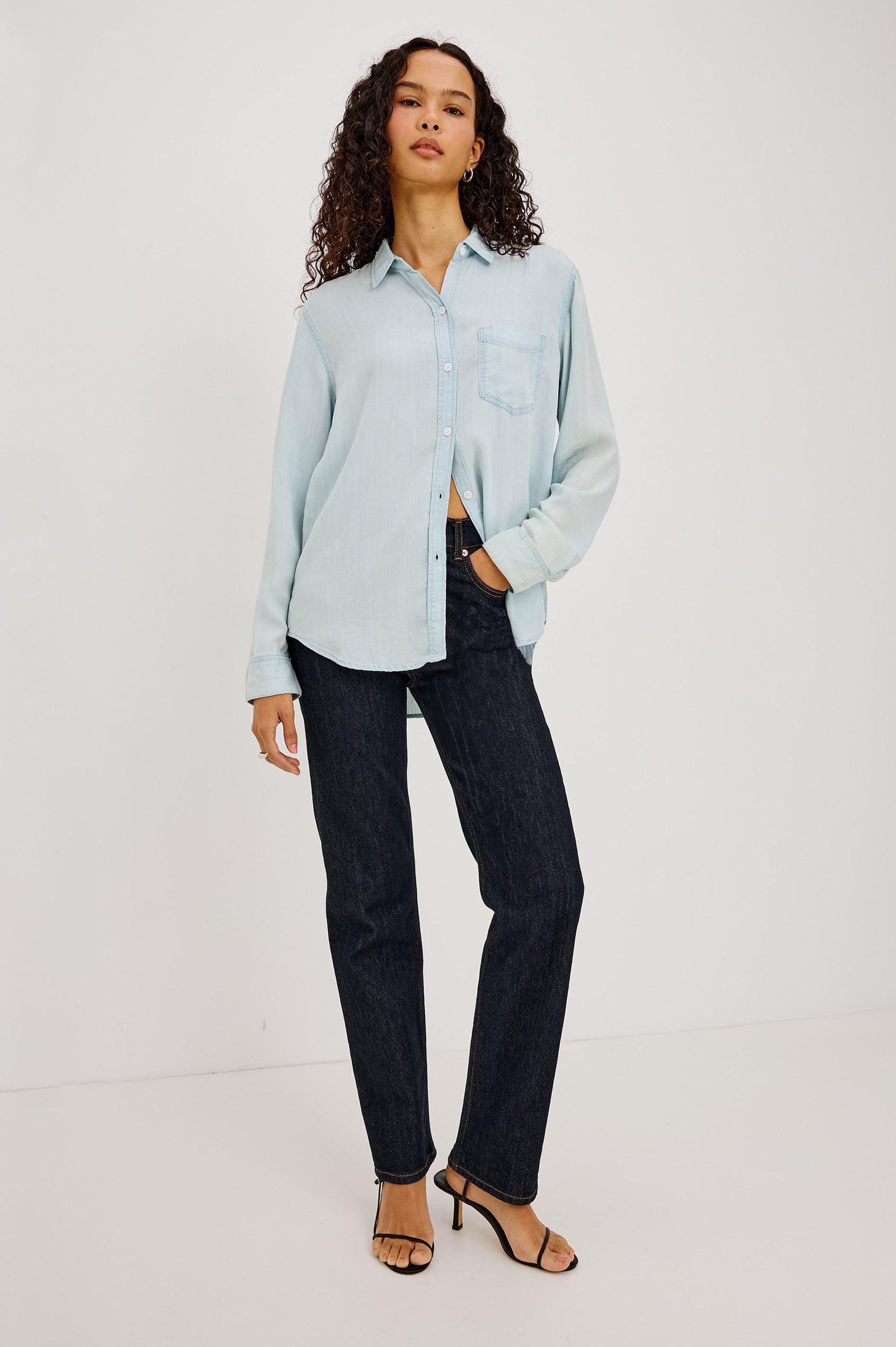 Ingrid Shirt in TENCEL™Denim With Classic Fit, Front Buttons, Chest Patch Pocket, and Long Sleeves in Light Vintage Colorway - Full Body Front View Featured on Model