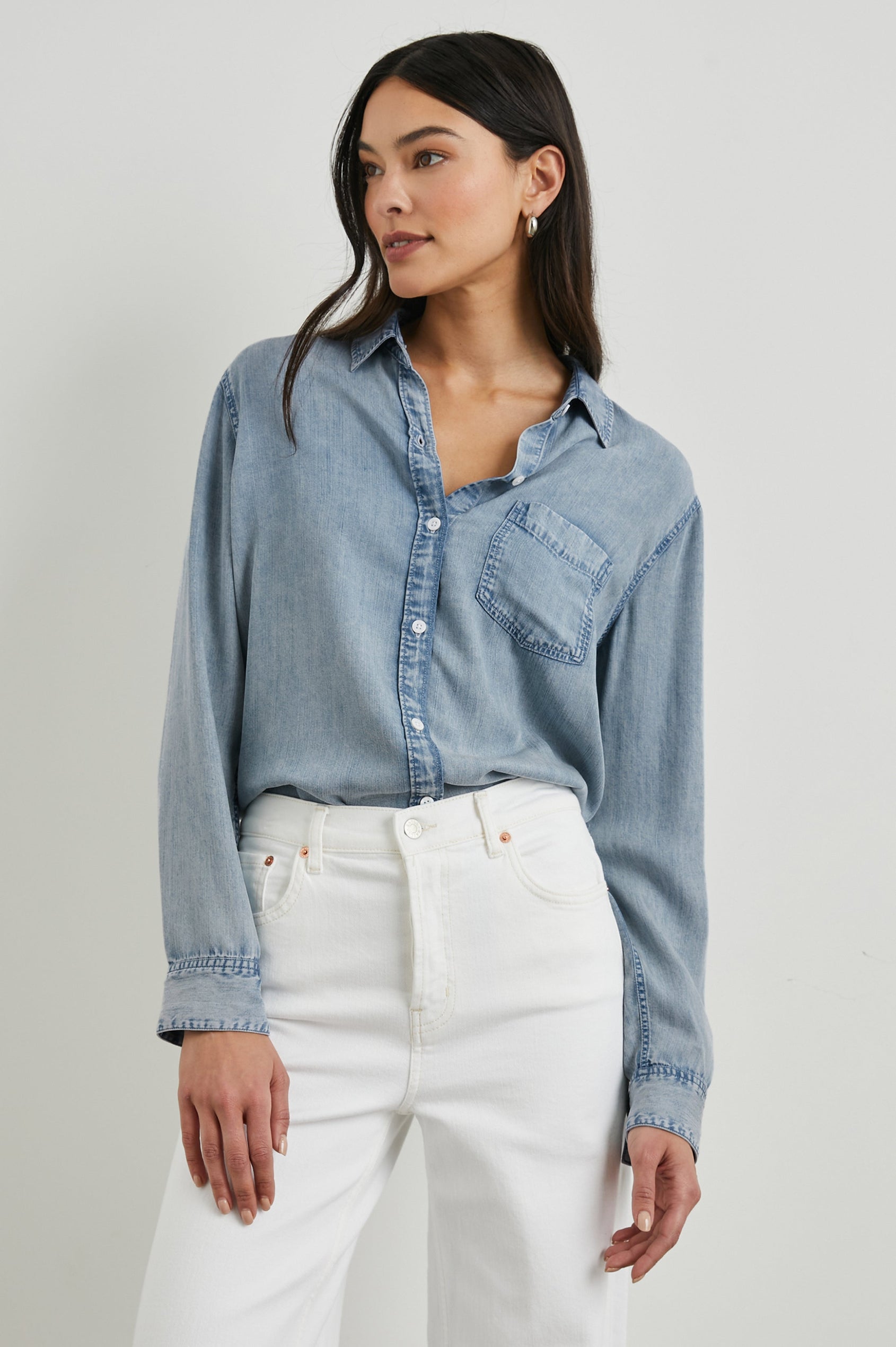 Ingrid Long Sleeve Denim Button Up with a Chest Patch Pocket in Med Vintage Cloud Wash Colorway - Front Tucked View Featured on Model
