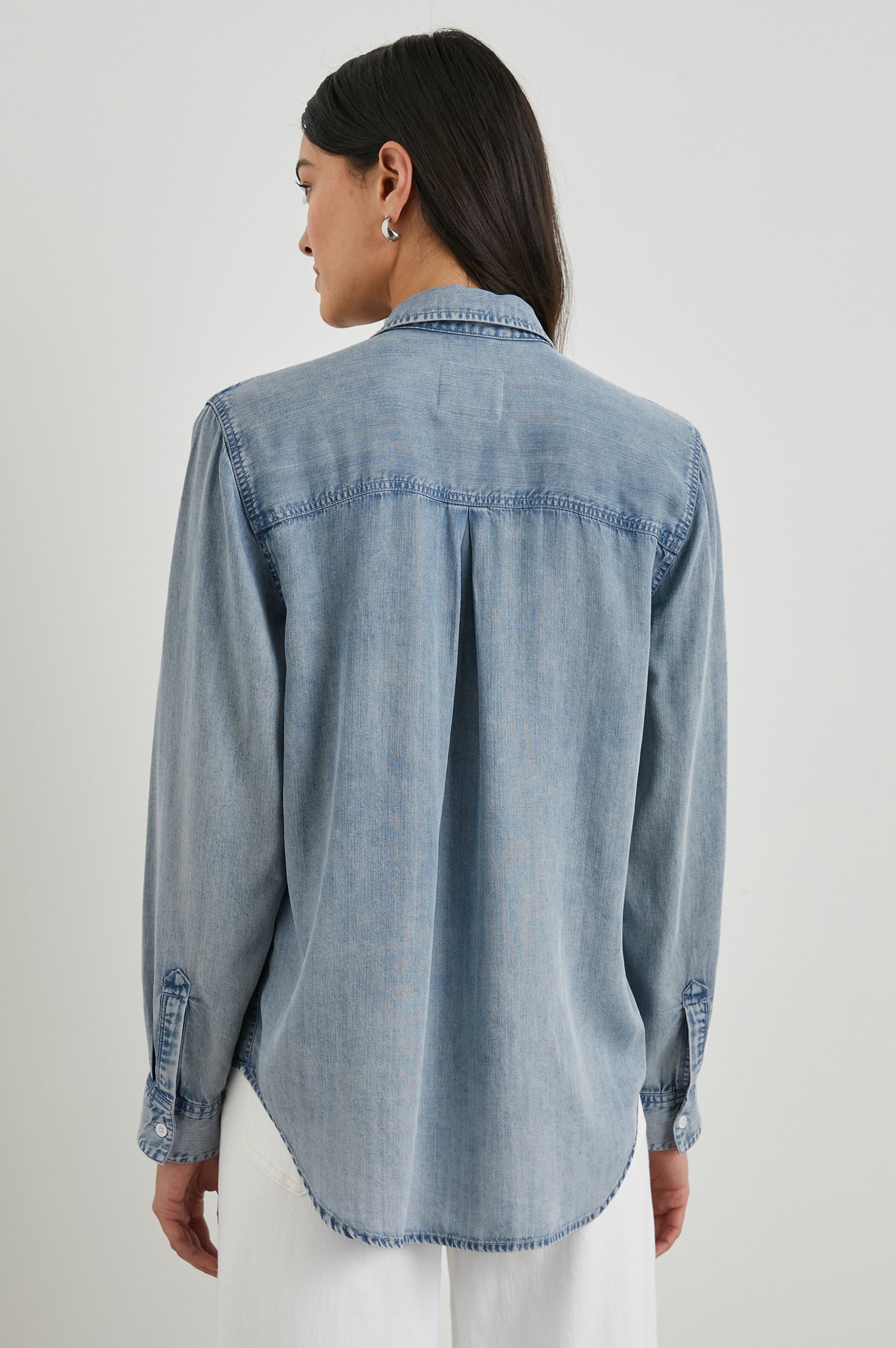 Ingrid Long Sleeve Denim Button Up with a Chest Patch Pocket in Med Vintage Cloud Wash Colorway - Back View Featured on Model