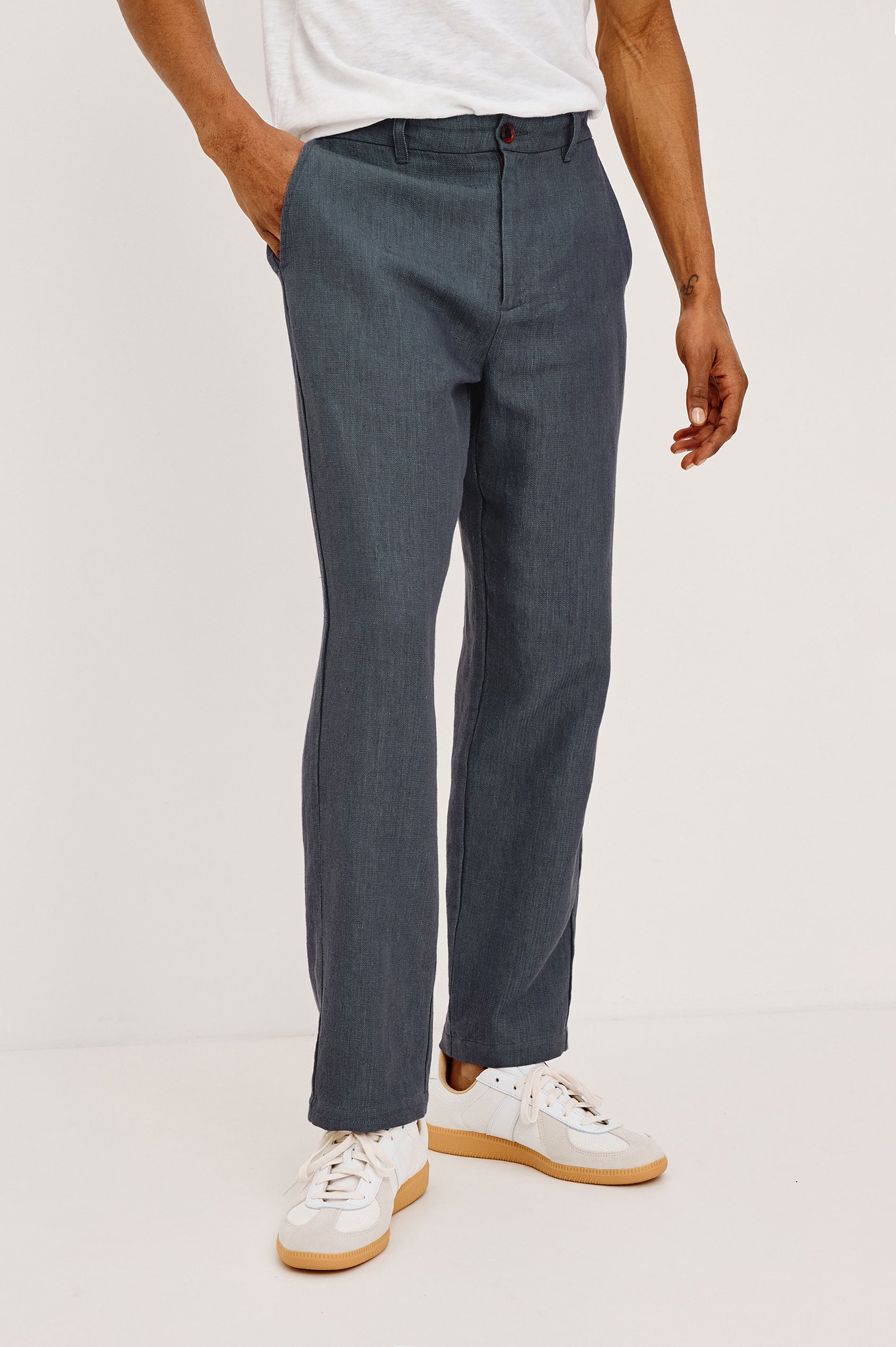 Irving Slim Straight Pant With Side Slant Pockets, and Back Welt Pockets in Meridian, a blue Colorway - Lower Body Front View Featured on Model