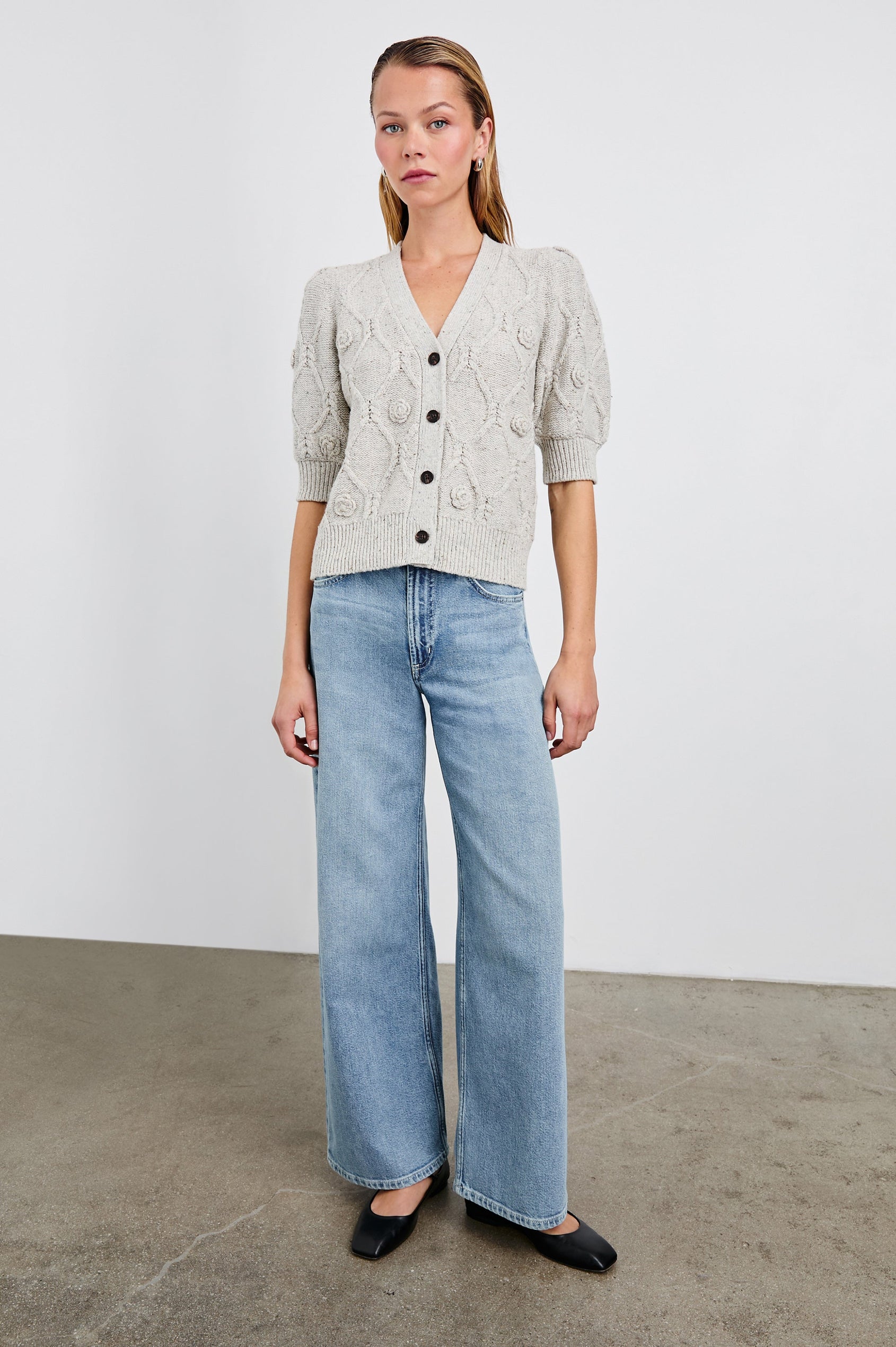 Isla Mid-length-Sleeve Cardigan with Ribbed Hems and Cuffs and Button Closure in Grey with Crochet Daisies Colorway - Front Full Body View Featured on Model