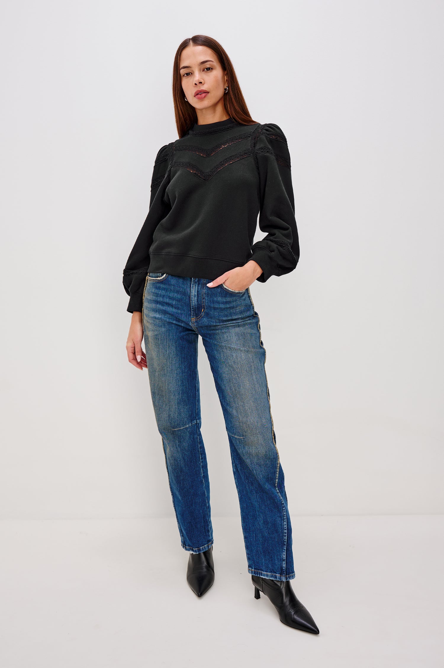 Isles Sweatshirt in French Terry With Sheer Embroidered Trim, a Mockneck, Long Puff Sleeves, and Ribbed Trim in Black Colorway - Full Body Front View Featured on Model