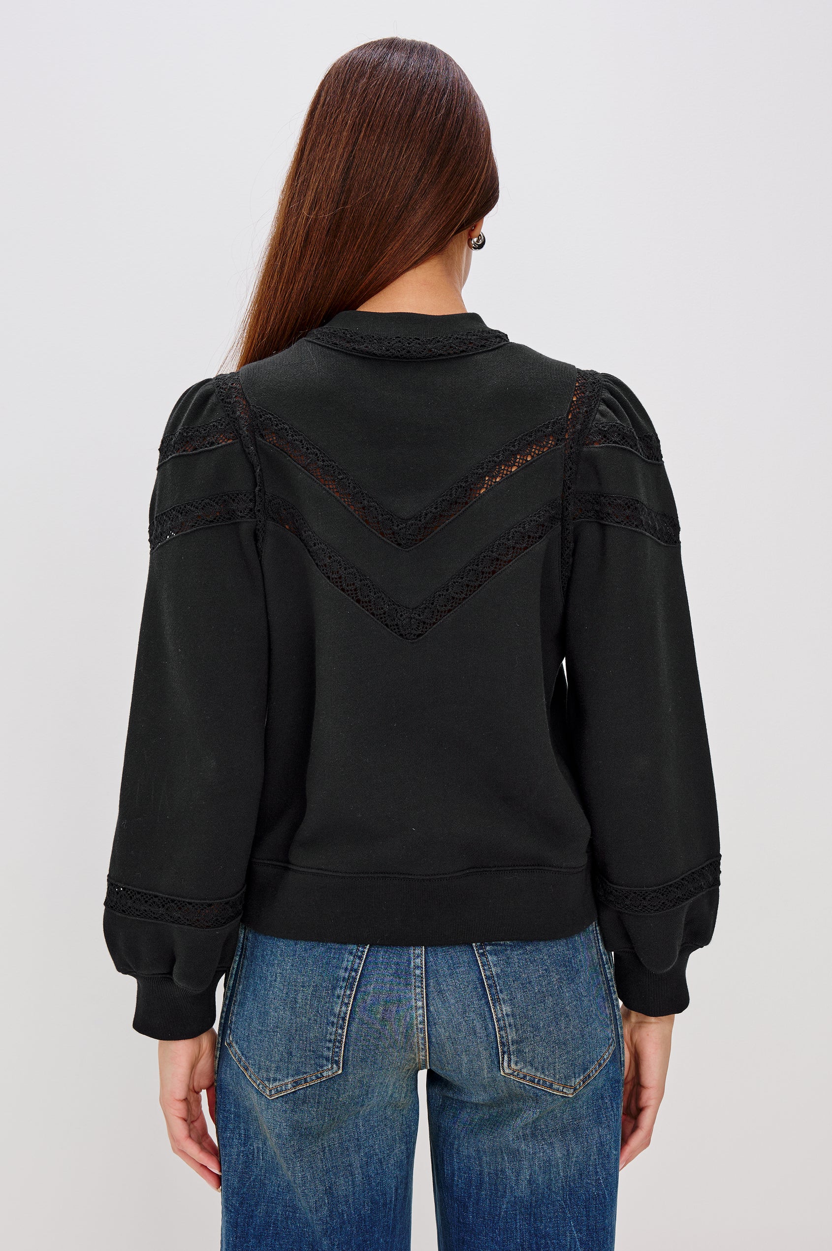 Isles Sweatshirt in French Terry With Sheer Embroidered Trim, a Mockneck, Long Puff Sleeves, and Ribbed Trim in Black Colorway - Upper Body Back View Featured on Model