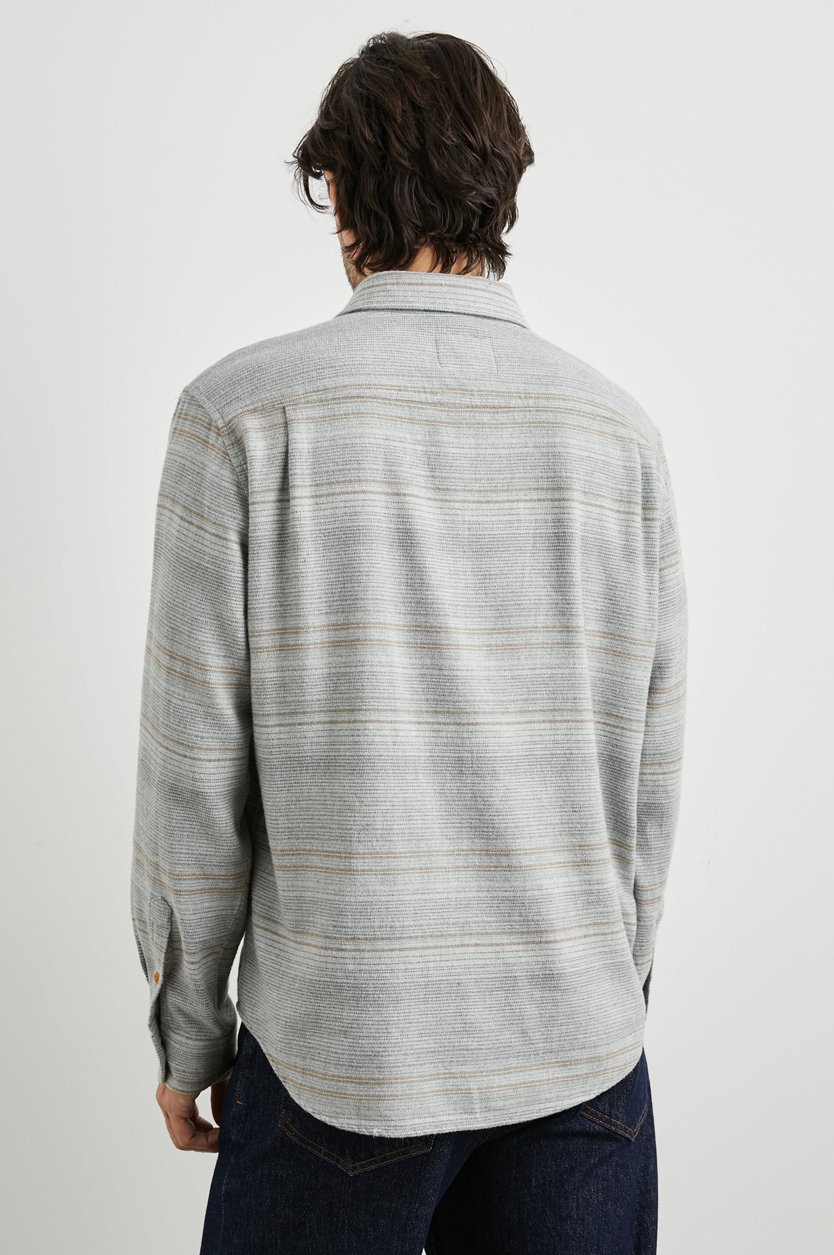 Ivan Long-Sleeve Button Up with Two Chest Patch Pockets in Grey Serape Colorway, with horizontal stripes in browns and greys on Grey - Back View Featured on Model
