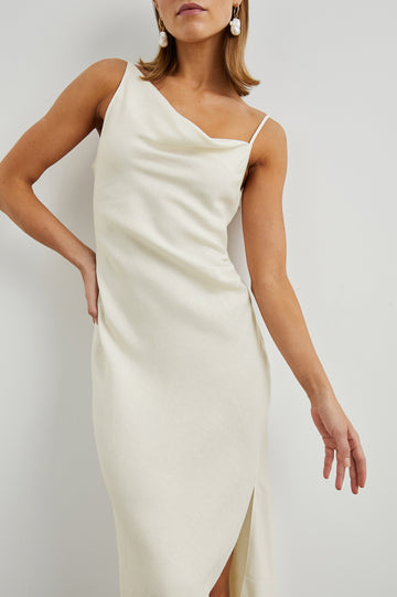 Lotus Sleeveless Midi Dress with an Asymmetrical Cowl Neck, Adjustable Back Spaghetti Straps, a Side Slit, Light Ruching on one Bodice Side in Lotus Colorway - Front View Featured on Model