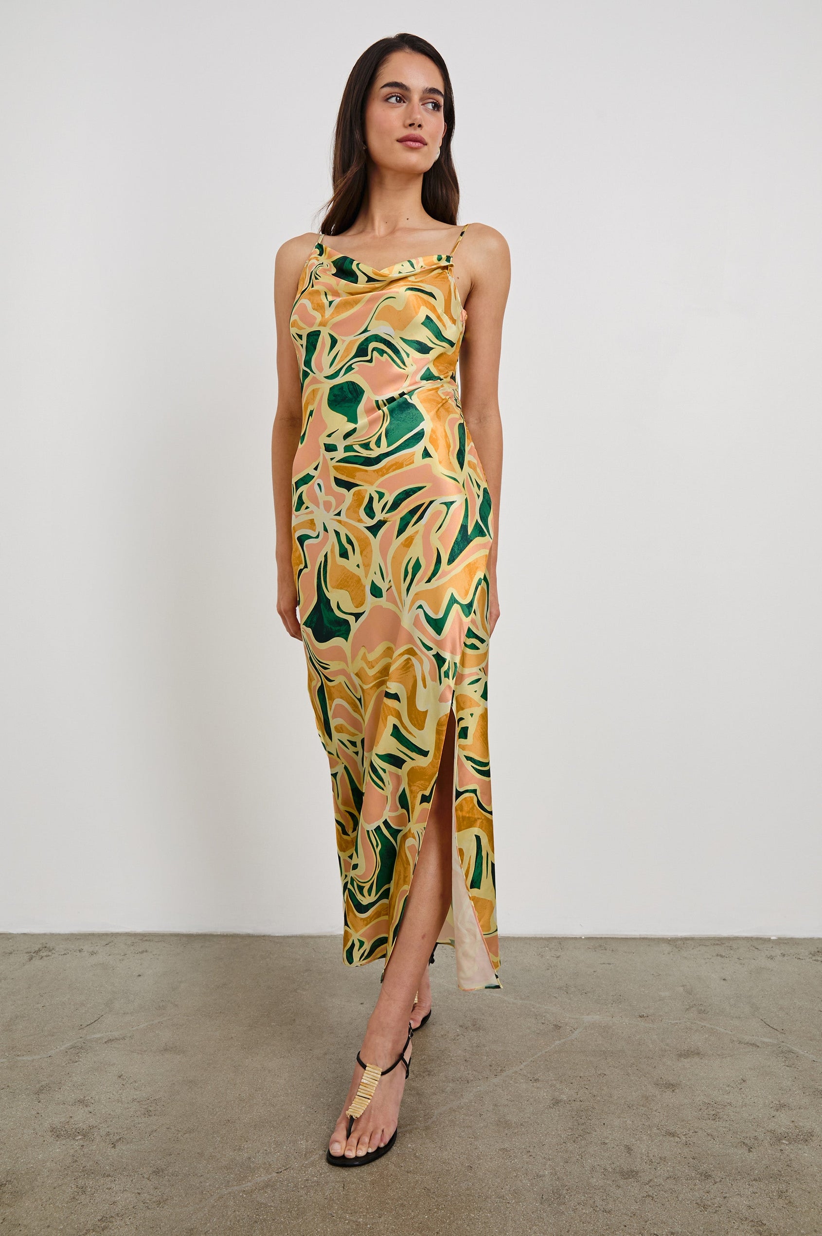 Jackie Midi Cowl Neck Dress with Asymmetrical Spaghetti Straps and a Curved Side Slit in Tulum Colorway. Full Body Front View Shown on Model.