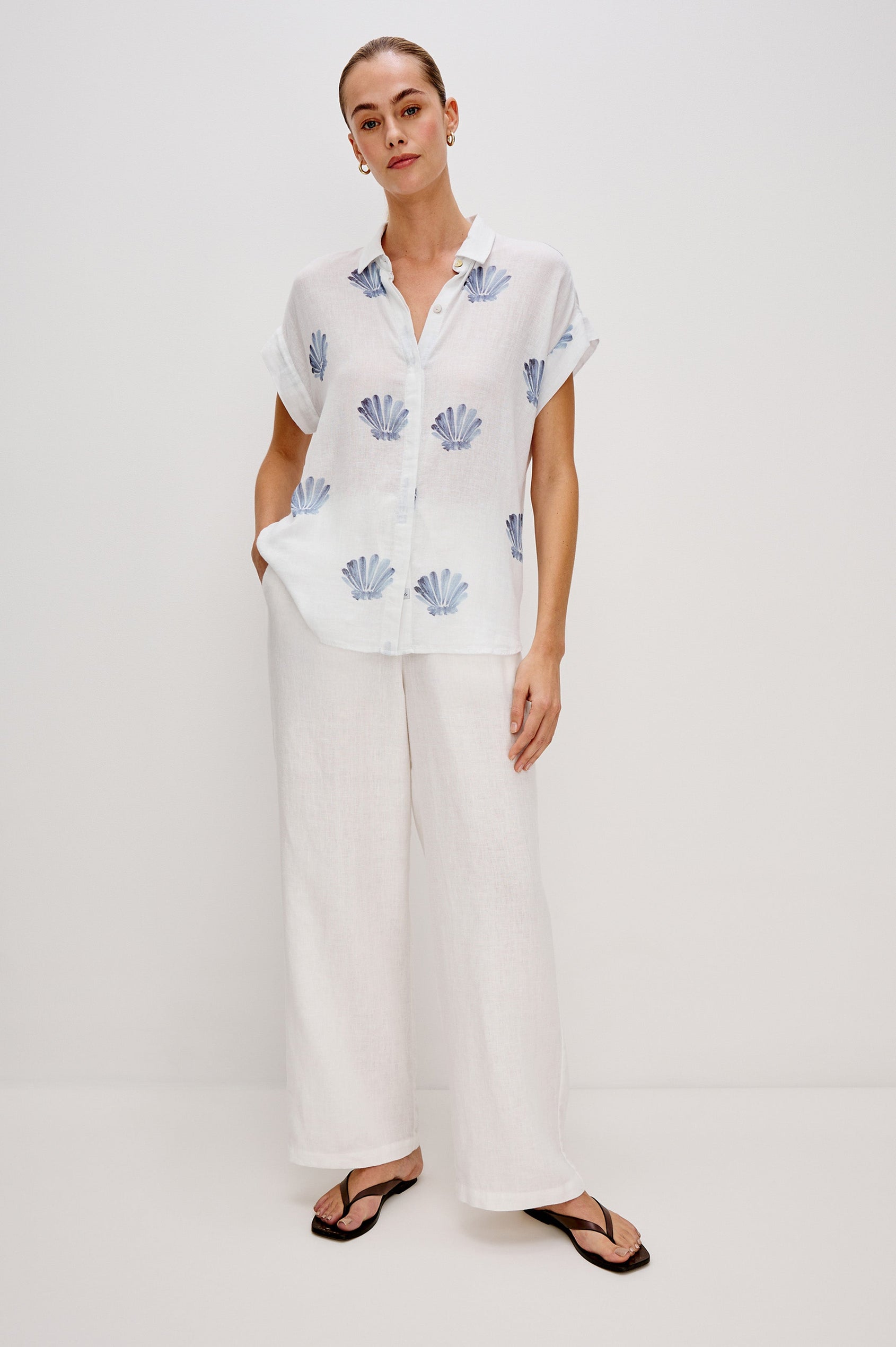 Jaime Collared Button Front Shirt with Short Cuffed Sleeves and Blue Seashells Colorway. Full Body Front View Shown on Model. 