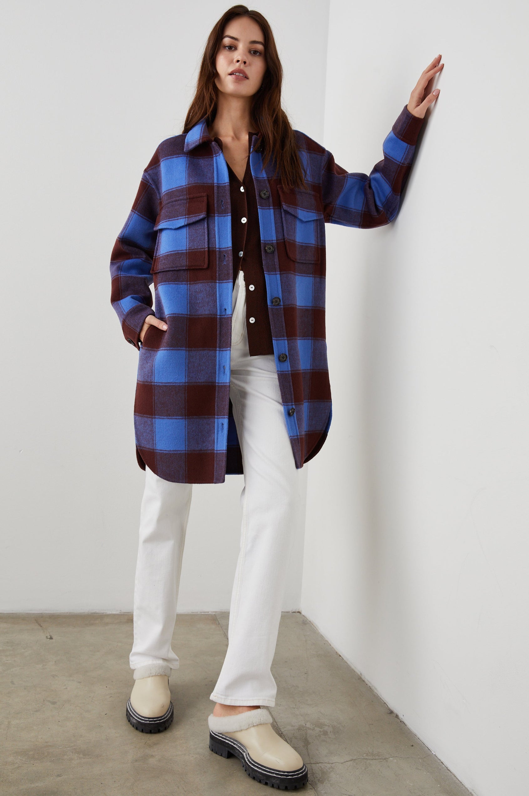 Jaro Mid-Thigh Length Coat with Button Closure, Button Cuffs, Two Chest Flap Pockets, Two Front Pockets and Side Hem Slits in Cobalt Chocolate Colorway, a Plaid - Front Full Body View Featured on Model 