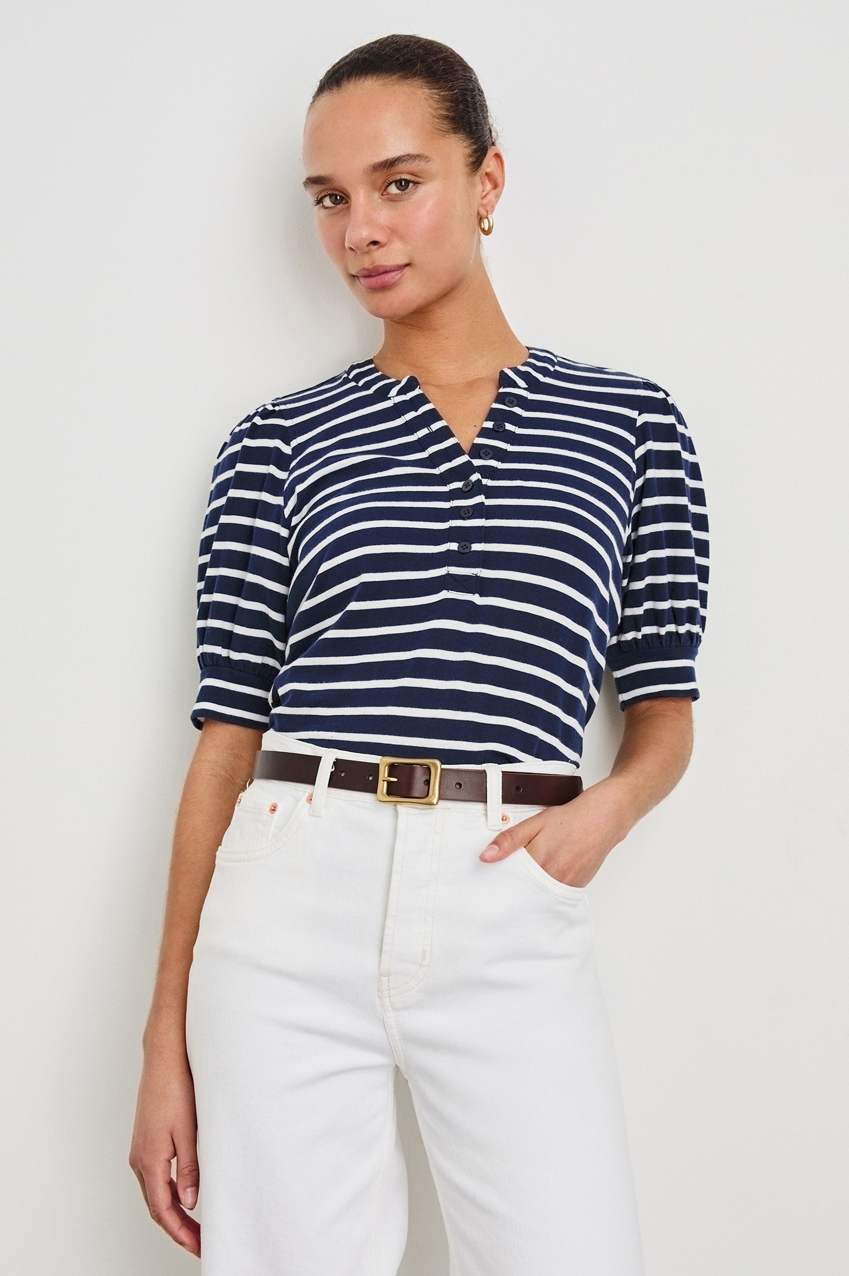 Jewel Puff Short Sleeve With Quarter Down Buttons In Colorway Navy Ivory Stripe - front view on model, tucked in with belt