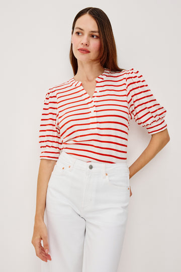 Jewel Top WIth Band Split V-Neck Front Buttons Short Puff Sleeves and Relaxed Fit in Scarlet Ivory Stripe Colorway - Upper Body Front View Featured on Model