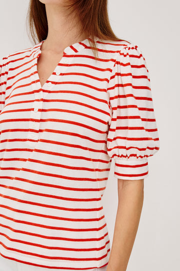 Jewel Top WIth Band Split V-Neck Front Buttons Short Puff Sleeves and Relaxed Fit in Scarlet Ivory Stripe Colorway - Upper Body Close Up View Featured on Model
