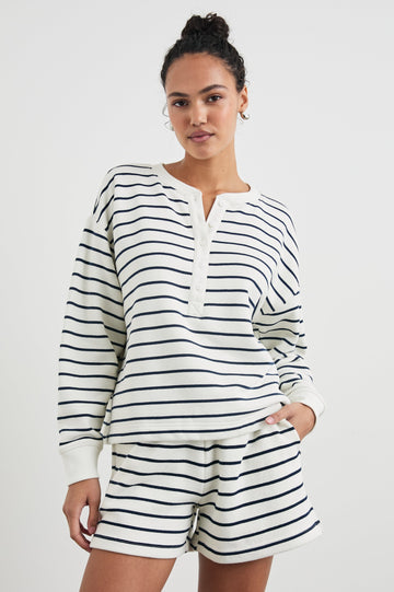 Joan Long-Sleeve Sweatshirt with Buttons to the Mid-Torso and Cuffed sleeves in Sailor Stripe Navy Colorway, horizontal stripes on white - Front View Featured on Model