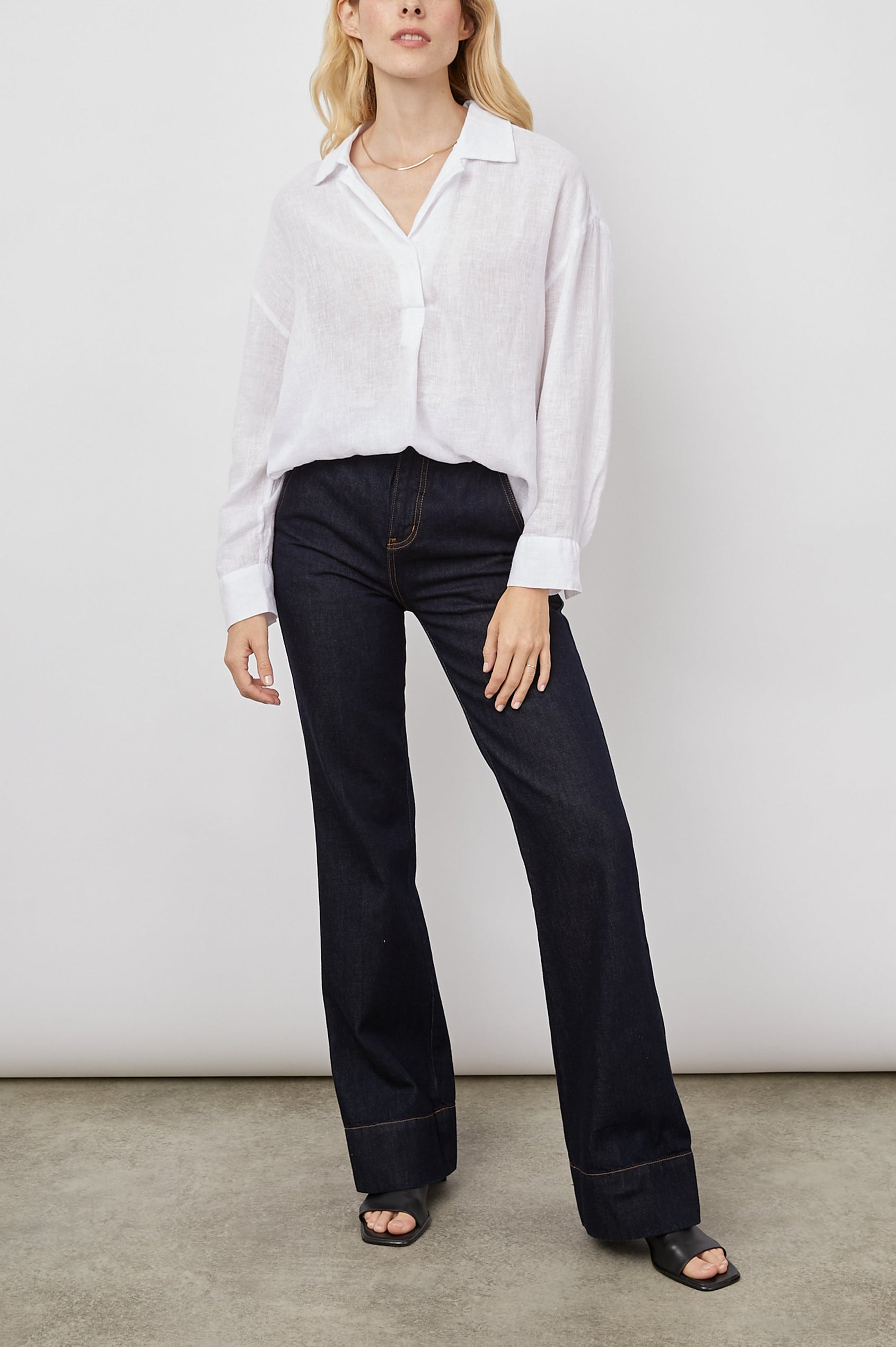 Jocelyn Long-Sleeve Shirt with Button Cuffs, a Collar and a V Neck with a Half-Sealed Placket in White Colorway - Front Full Body View Featured on Model 
