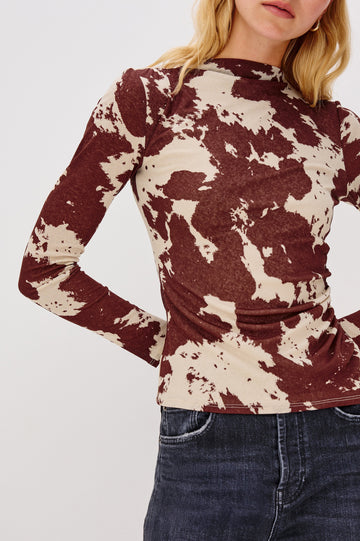 Joelle Long Sleeve Top with An Asymmetrical Mock Neck and Shirring on the Right Shoulder in Cowgirl Colorway - Close Up View Featured on Model