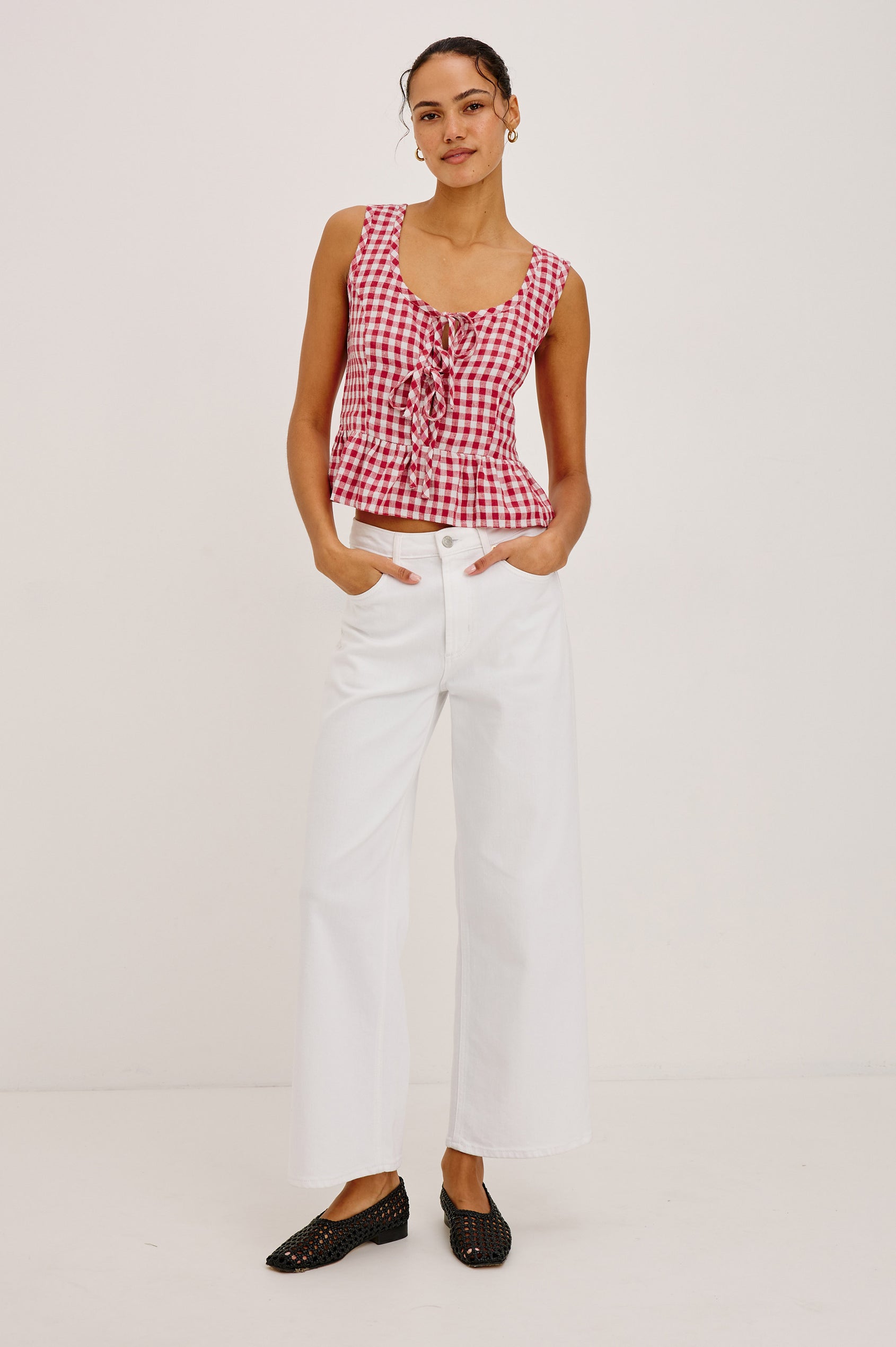 Jonah Crop Top in Linen With Plunging Front With Self-Ties, Side Seam Zipper, Front Princess Seams, and Peplum Hem in Picnic Check Colorway - Full Body Front View Featured on Model
