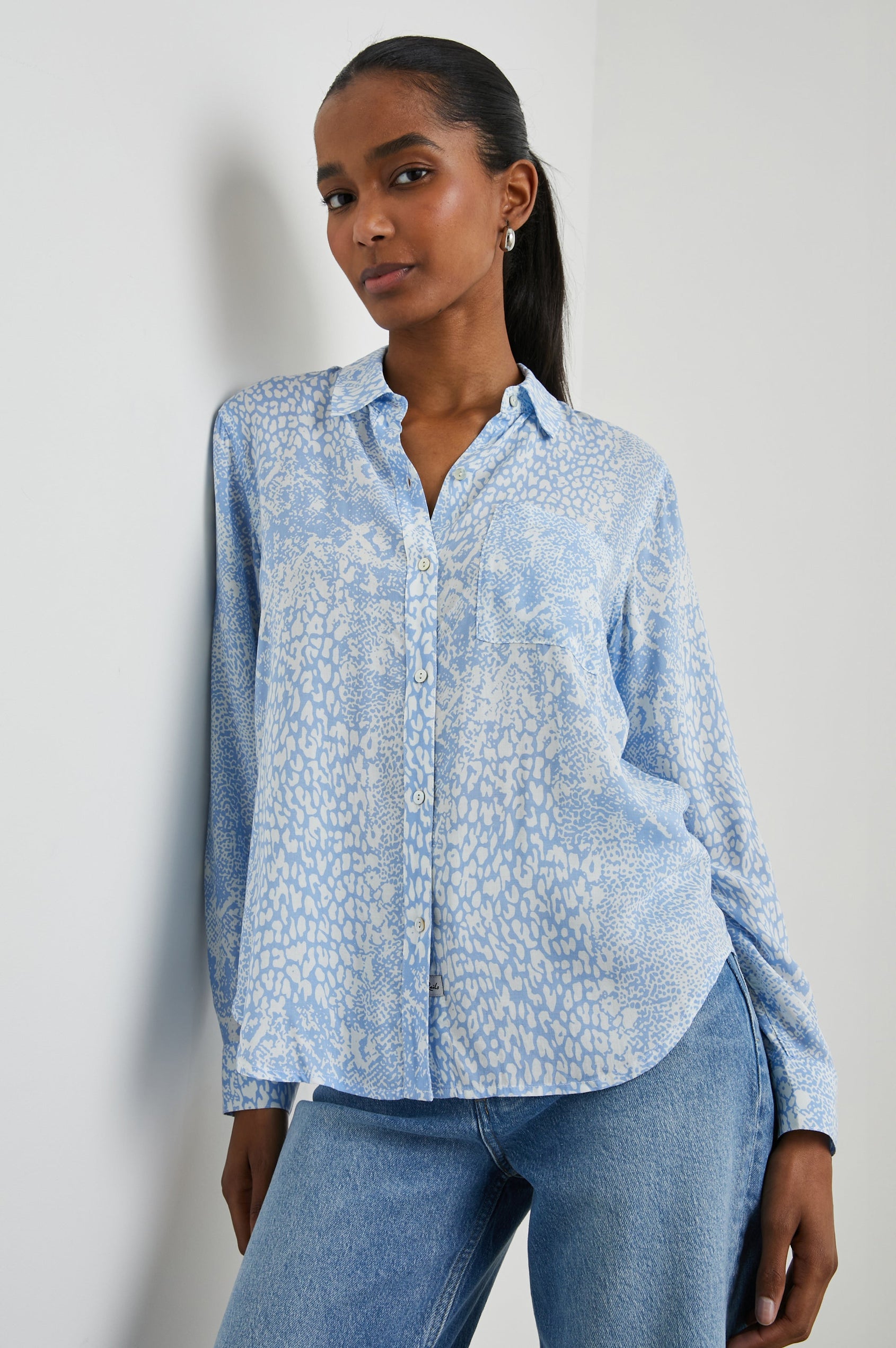 Josephine Long-Sleeve Button Down with a Chest Patch Pocket in Aqua Mixed Animal Colorway, aqua animal patterns on white - Front View Featured on Model