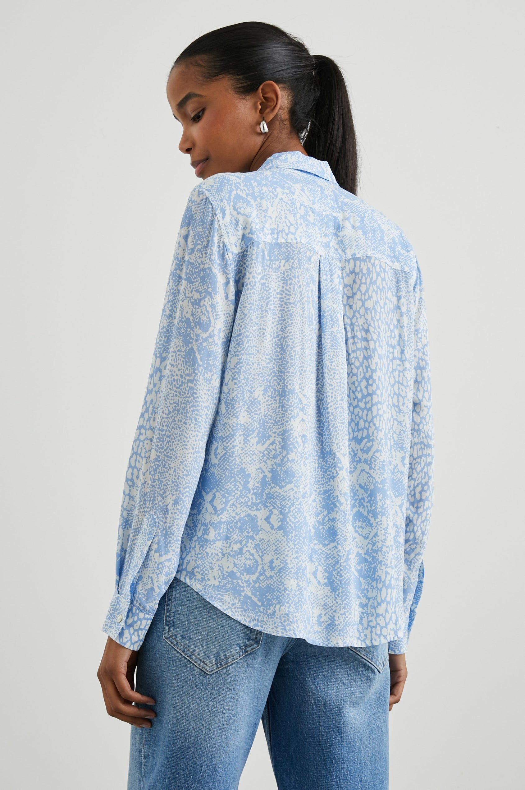 Josephine Long-Sleeve Button Down with a Chest Patch Pocket in Aqua Mixed Animal Colorway, aqua animal patterns on white - Back View Featured on Model