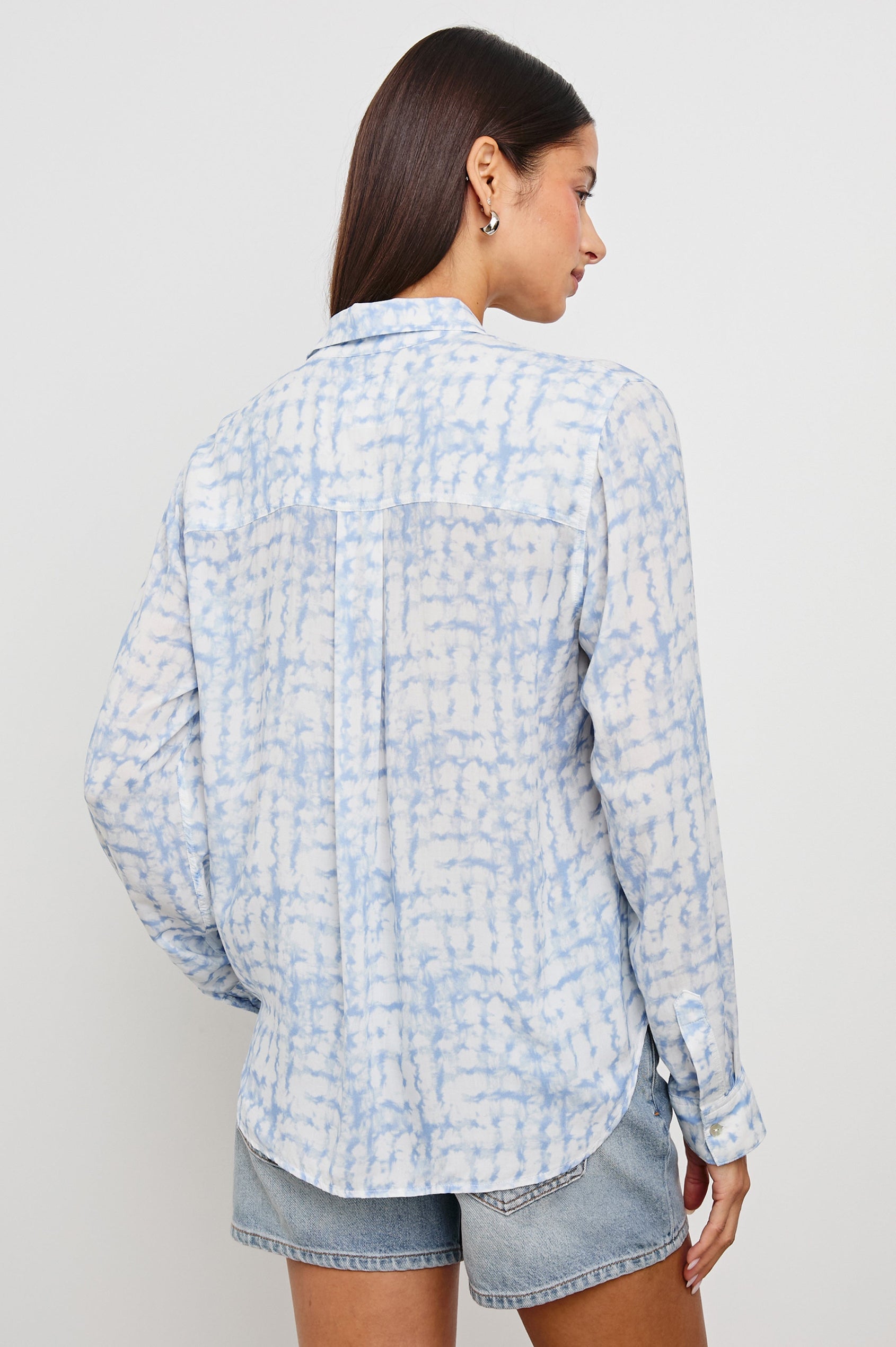 Josephine Long-Sleeve Button Down with a Chest Patch Pocket in Diffused Plaid Colorway, blues and white pattern - Back View Featured on Model