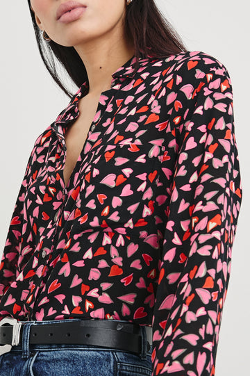 Josephine Long-Sleeve Button Down with a Chest Patch Pocket in Love Struck Colorway, hearts in red and pinks on black - Front View Featured on Model