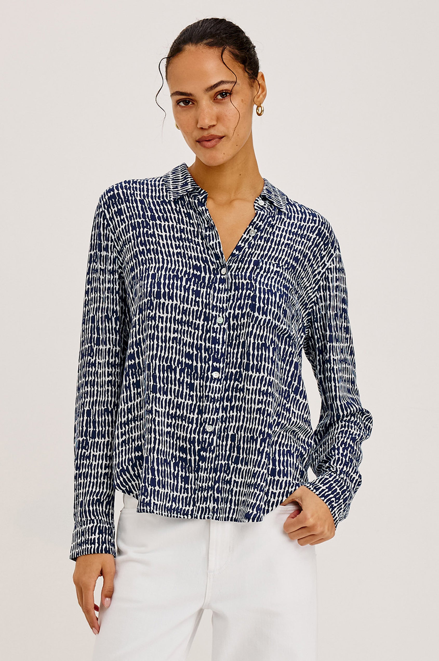 Josephine Button-Up Shirt in Feather Rayon With Collar, Long Sleeves, Relaxed Fit, And Chest Pocket in Navy Pebbled Colorway - Upper Body Front View Featured on Model