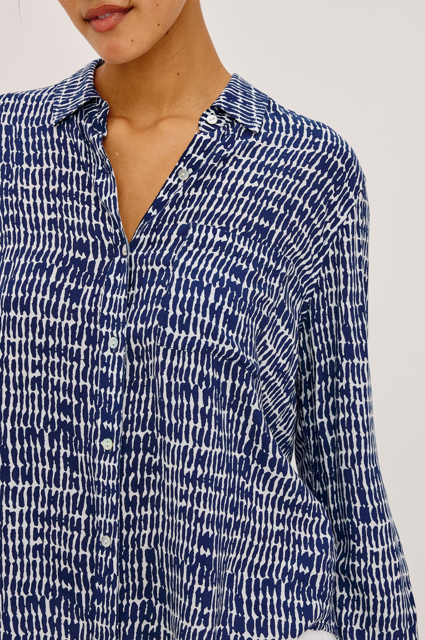 Josephine Button-Up Shirt in Feather Rayon With Collar, Long Sleeves, Relaxed Fit, And Chest Pocket in Navy Pebbled Colorway - Upper Body Front View Featured on Model