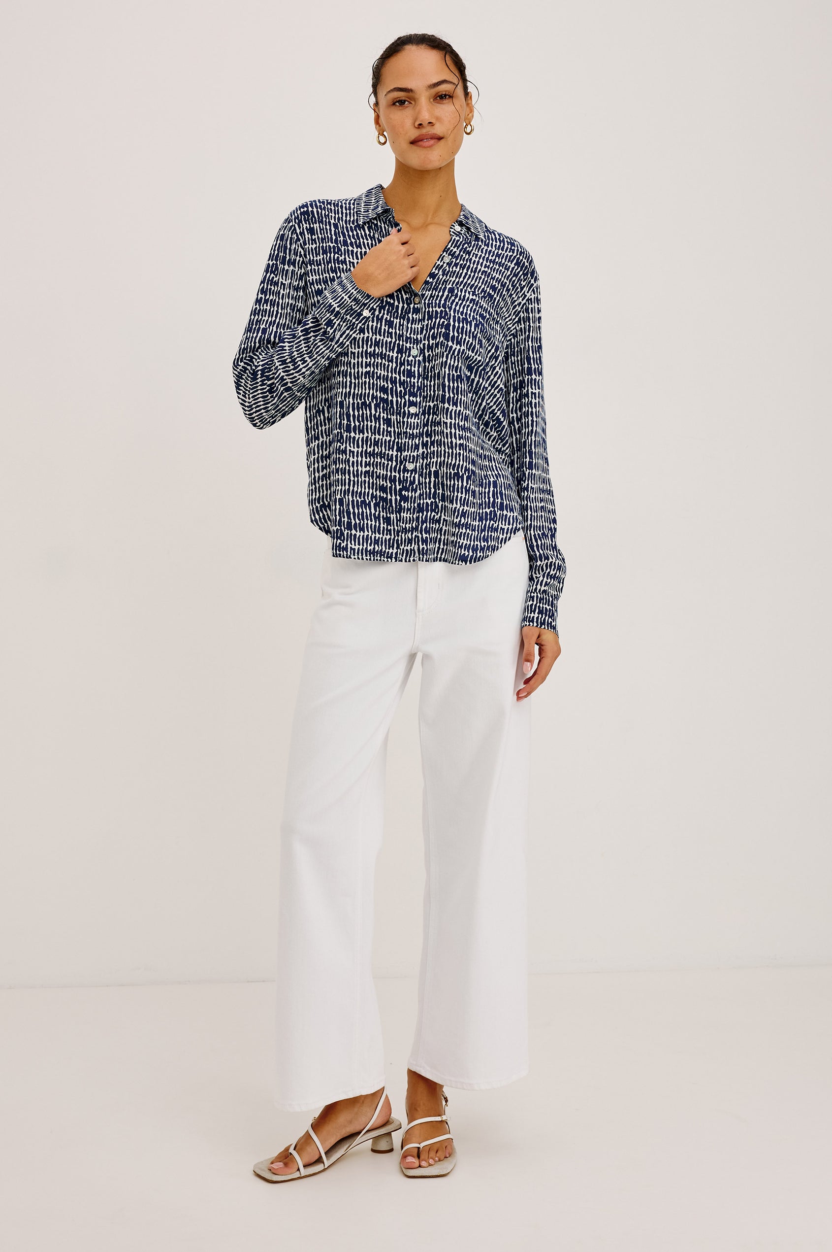 Josephine Button-Up Shirt in Feather Rayon With Collar, Long Sleeves, Relaxed Fit, And Chest Pocket in Navy Pebbled Colorway - Full Body Front View Featured on Model