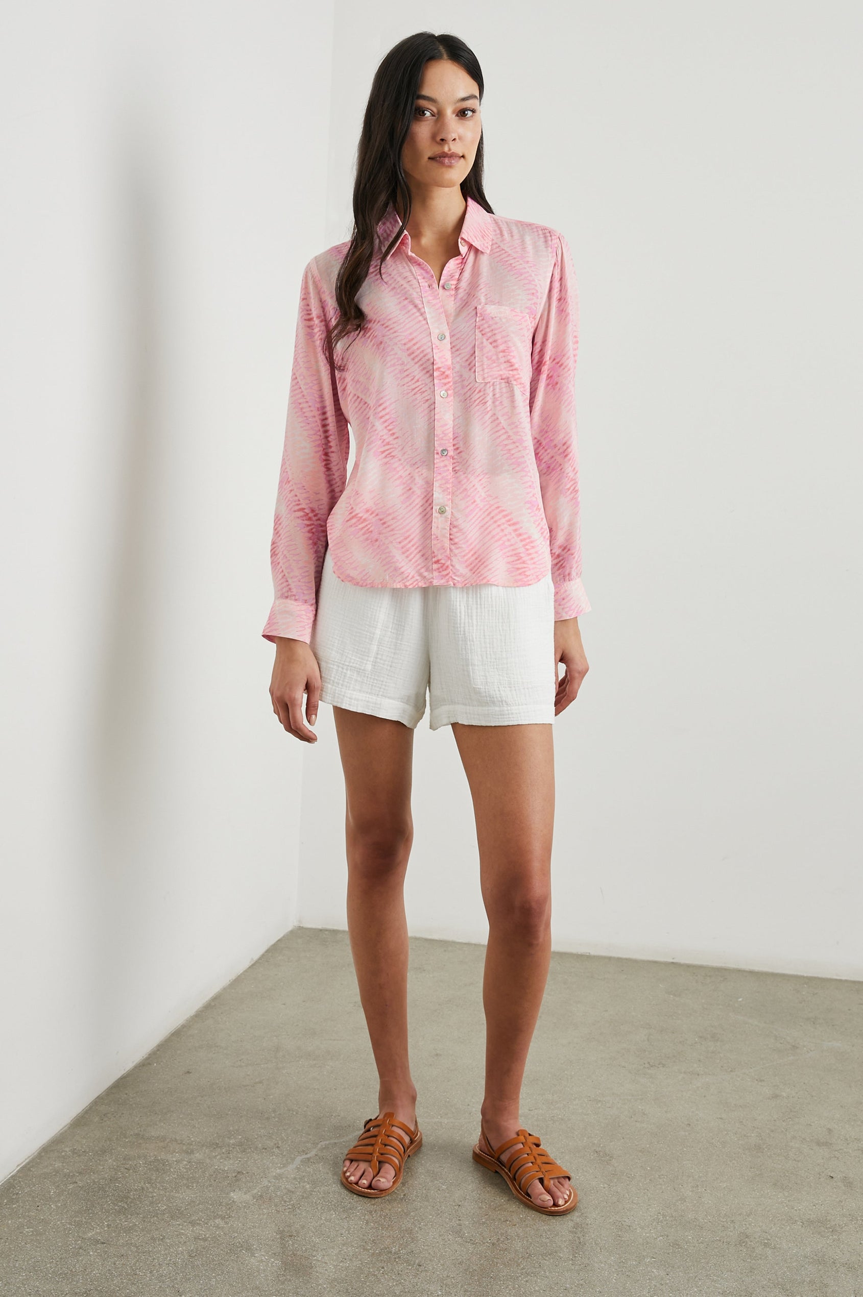 Josephine Long-Sleeve Button Down with a Chest Patch Pocket in Rose Reef Colorway, a pattern in pinks - Front Full Body View Featured on Model