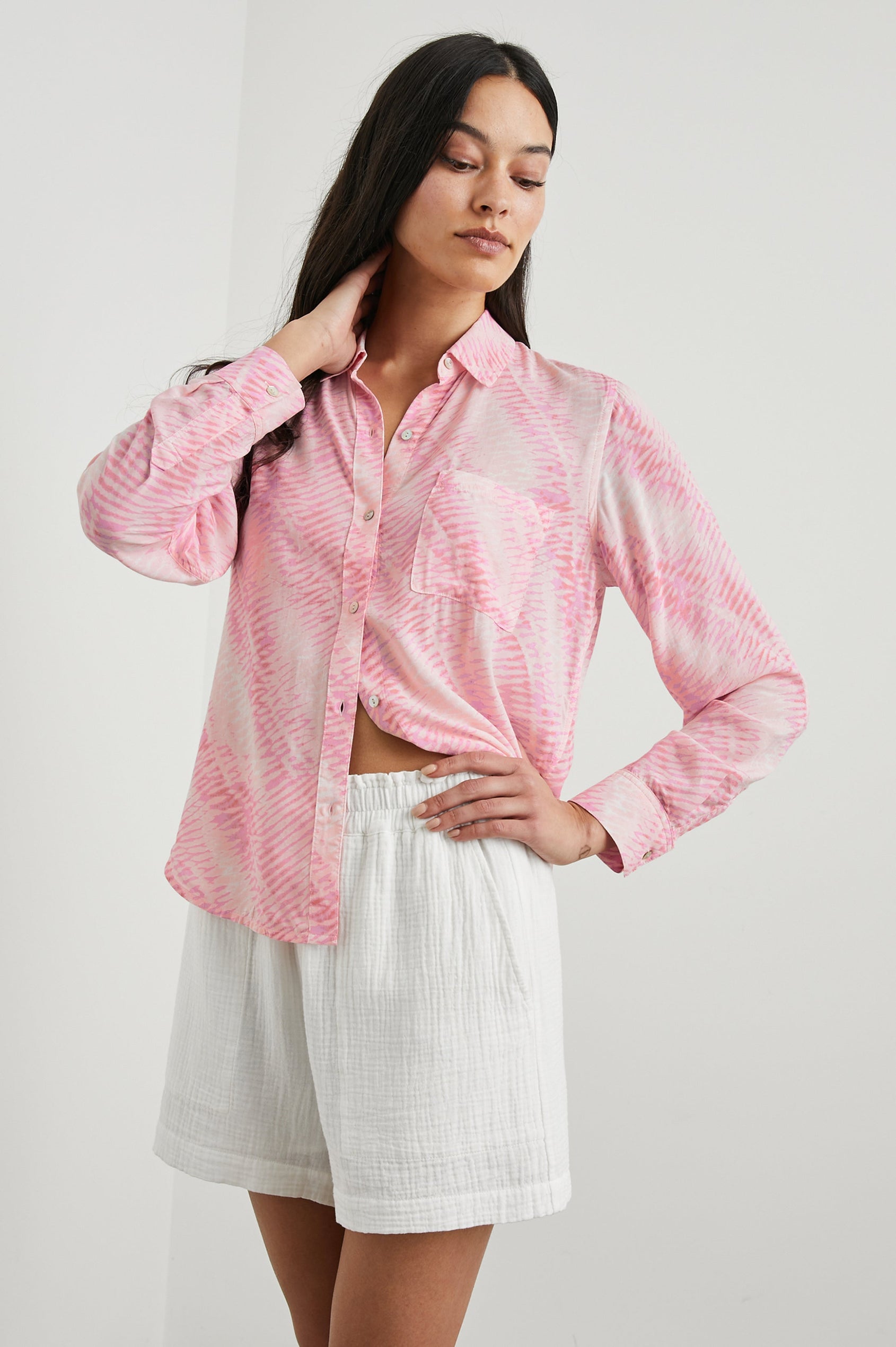 Josephine Long-Sleeve Button Down with a Chest Patch Pocket in Rose Reef Colorway, a pattern in pinks - Front View Featured on Model