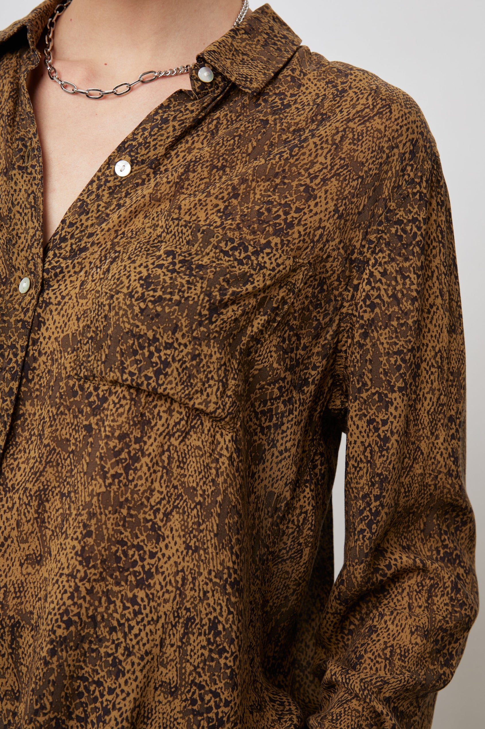Josephine Long-Sleeve Button Down with a Chest Patch Pocket in Sepia Python Colorway, pattern in browns on Sepia - Front View Featured on Model