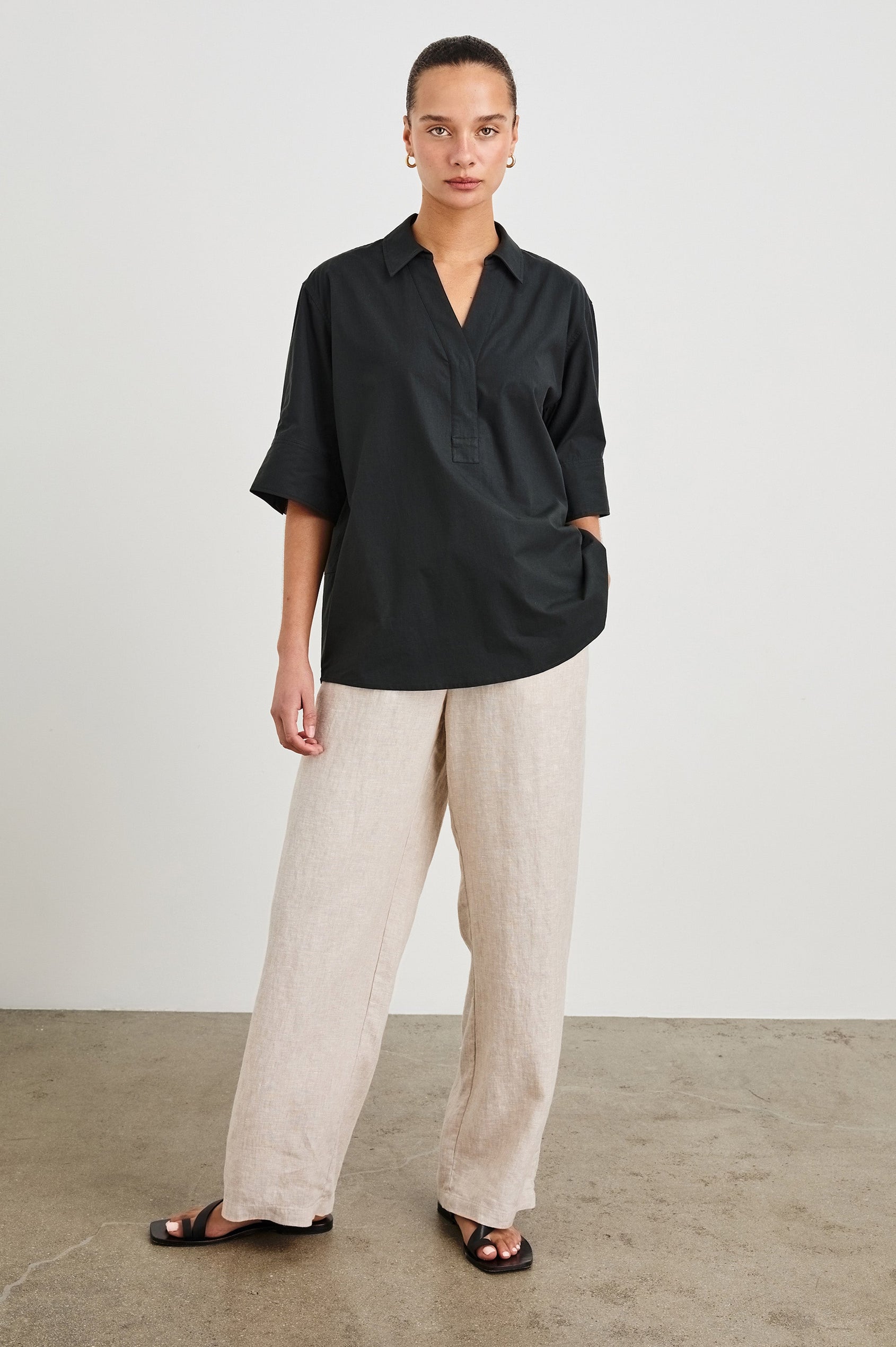 Juda 3/4 Sleeve Top With Front Placket And Collar In Colorway Black - full body front view on model