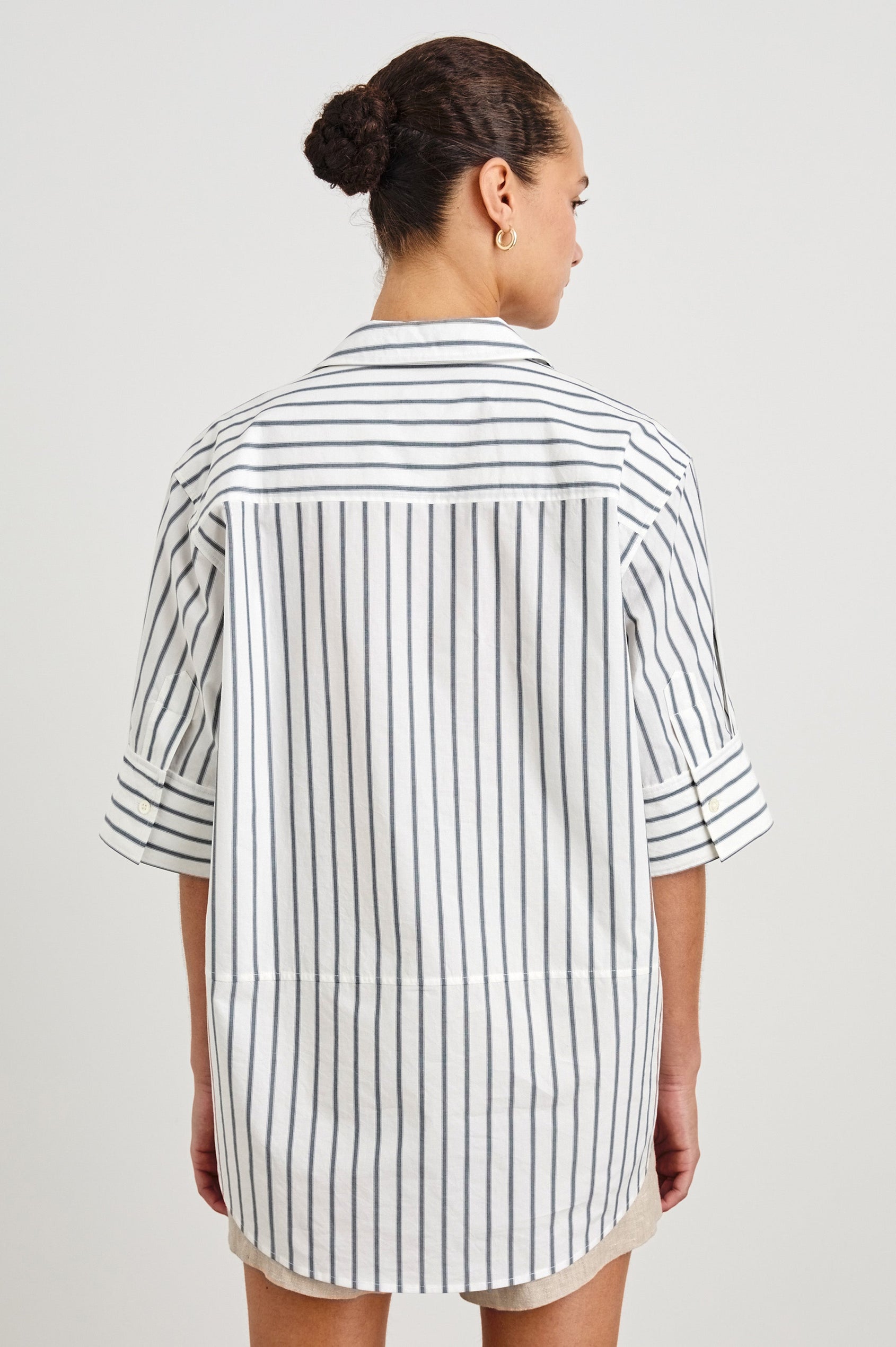 Juda 3/4 Sleeve Top With Front Placket And Collar In Colorway Chalk Slate Stripe - back view on model