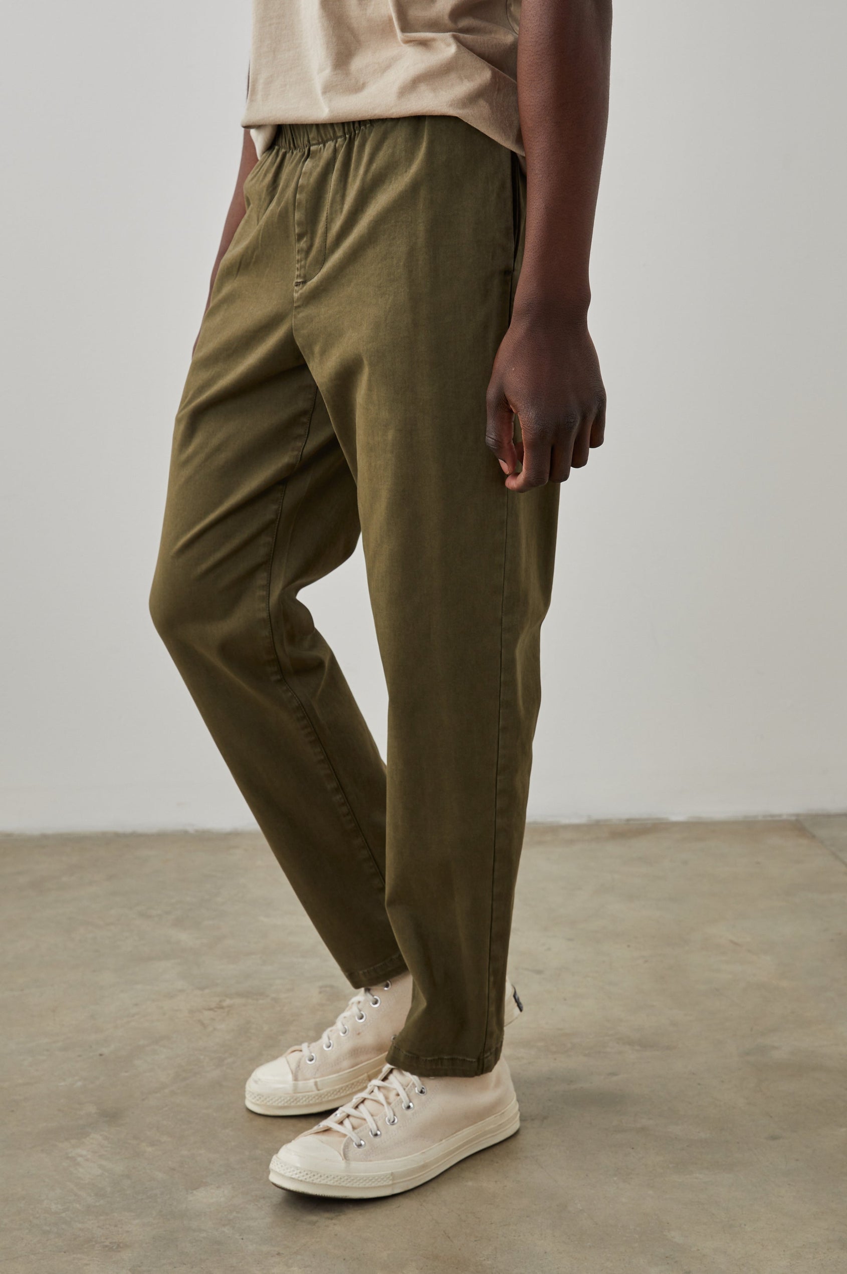  Julian Pants with an Elastic Waist, Two Front Pockets and Two Back Welt Pockets in Moss Colorway - Front View Featured on Model 