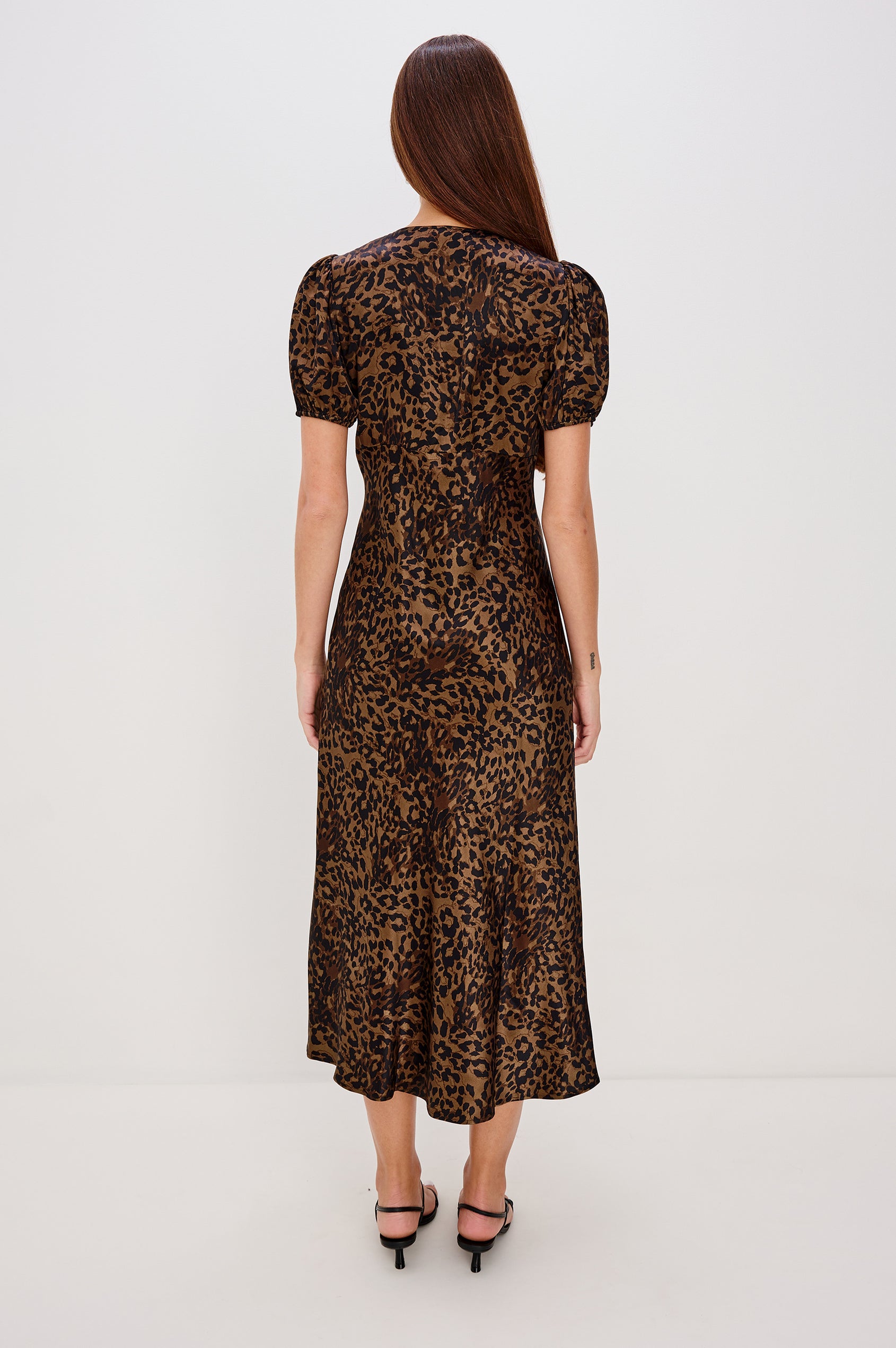 Junia Midi-Length Bias-Cut Slip Dress in Satin-Back Crepe With a V-Neckline, and Short Puff Sleeves in Ginger Spotted Colorway - Full Body Back View Featured on Model