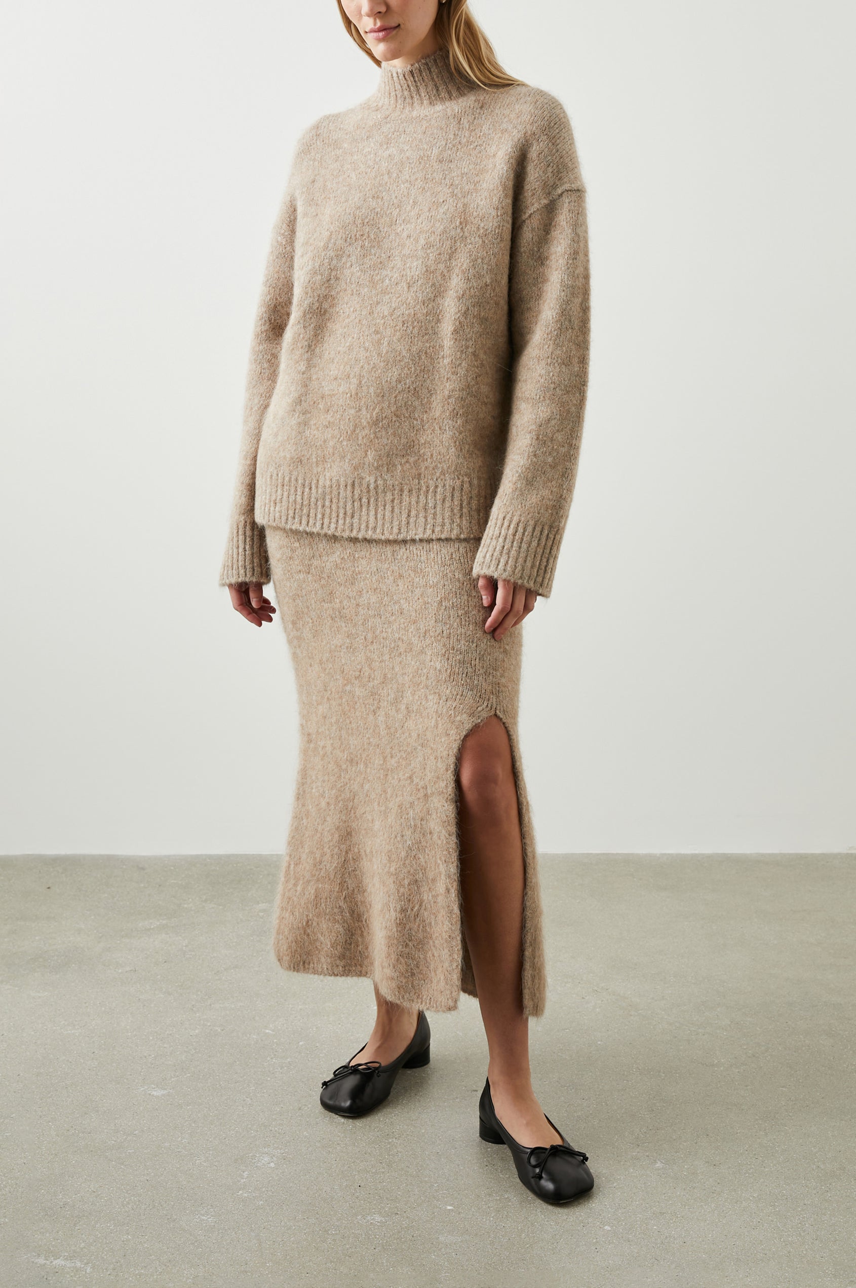 Kacia Long-Sleeve Sweater with a Mock Neck and Ribbed Trim in Oatmeal Colorway - Front Full Body View Featured on Model 